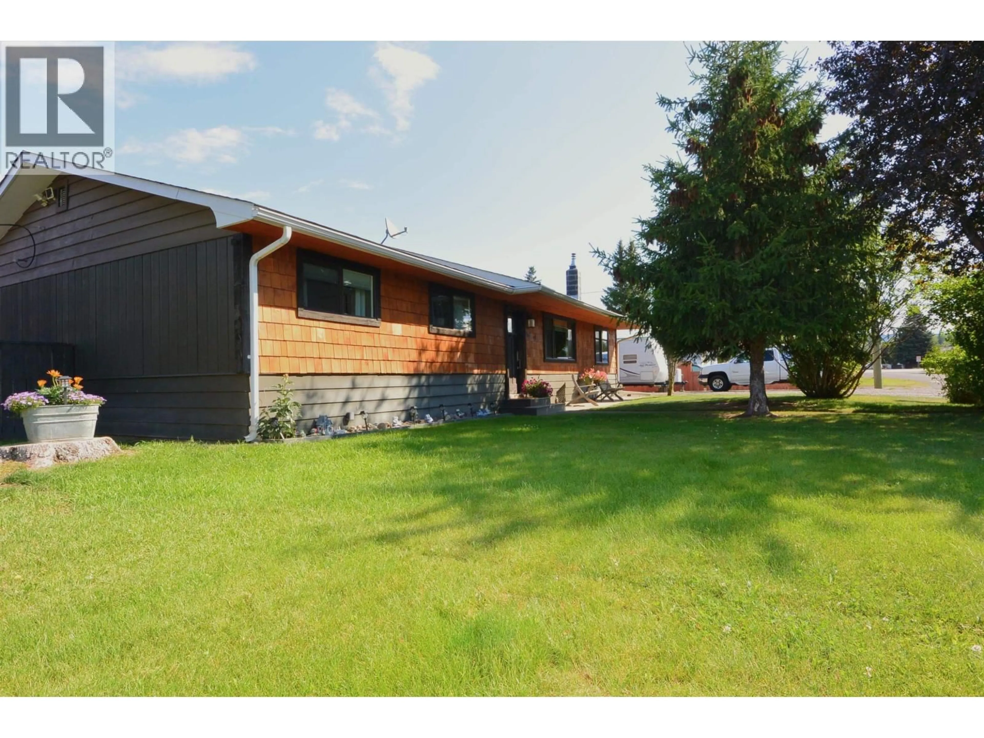 A pic from outside/outdoor area/front of a property/back of a property/a pic from drone, street for 3457 15TH STREET, Houston British Columbia V0J1Z0