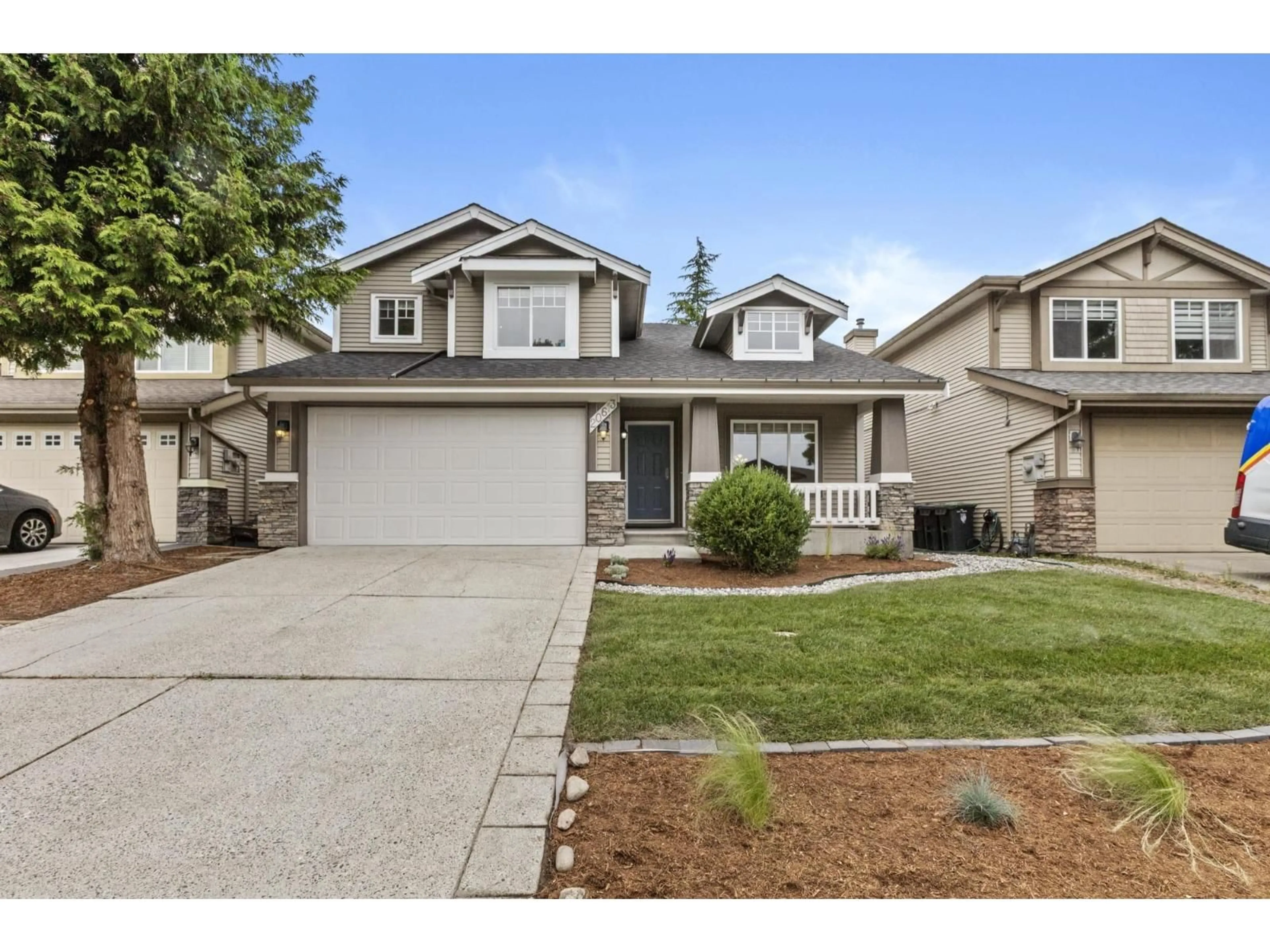 Home with vinyl exterior material, street for 20613 66A AVENUE, Langley British Columbia V2Y2Y4