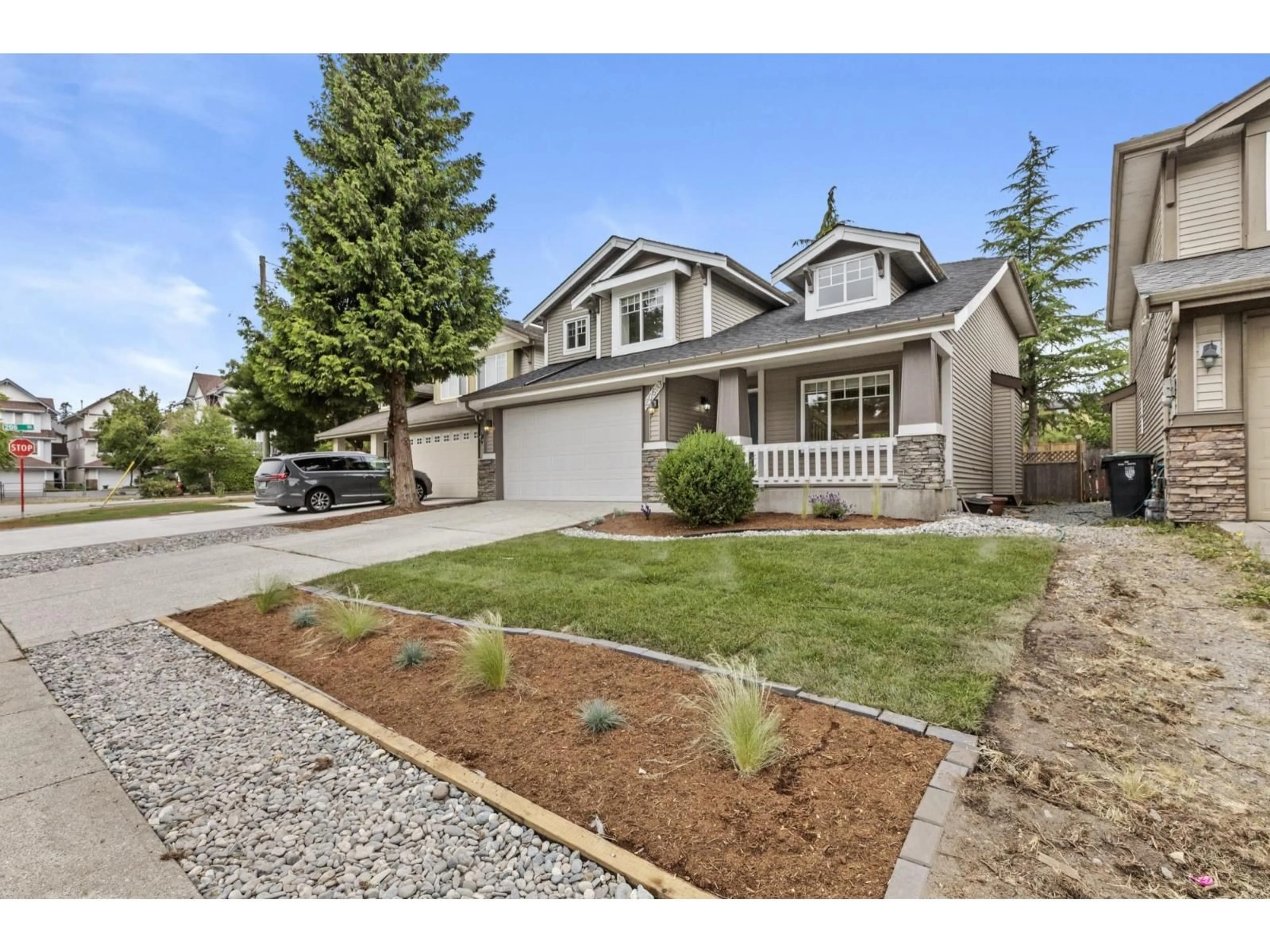 Home with vinyl exterior material, street for 20613 66A AVENUE, Langley British Columbia V2Y2Y4