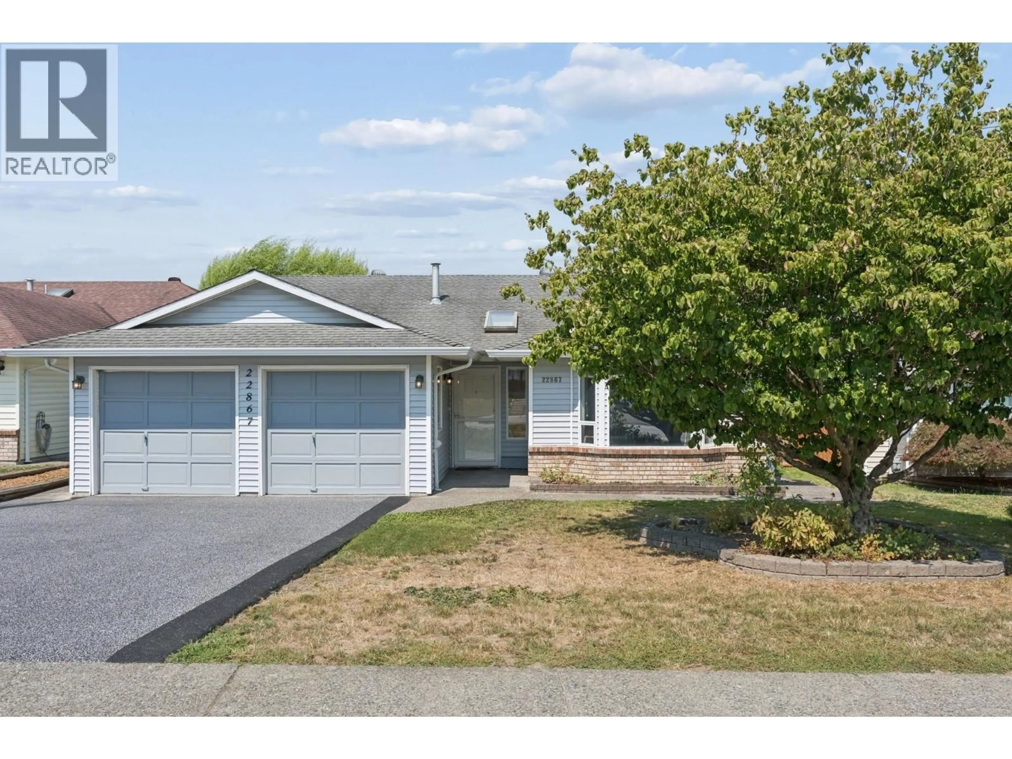 Home with vinyl exterior material, street for 22867 REID AVENUE, Maple Ridge British Columbia V2X9X1