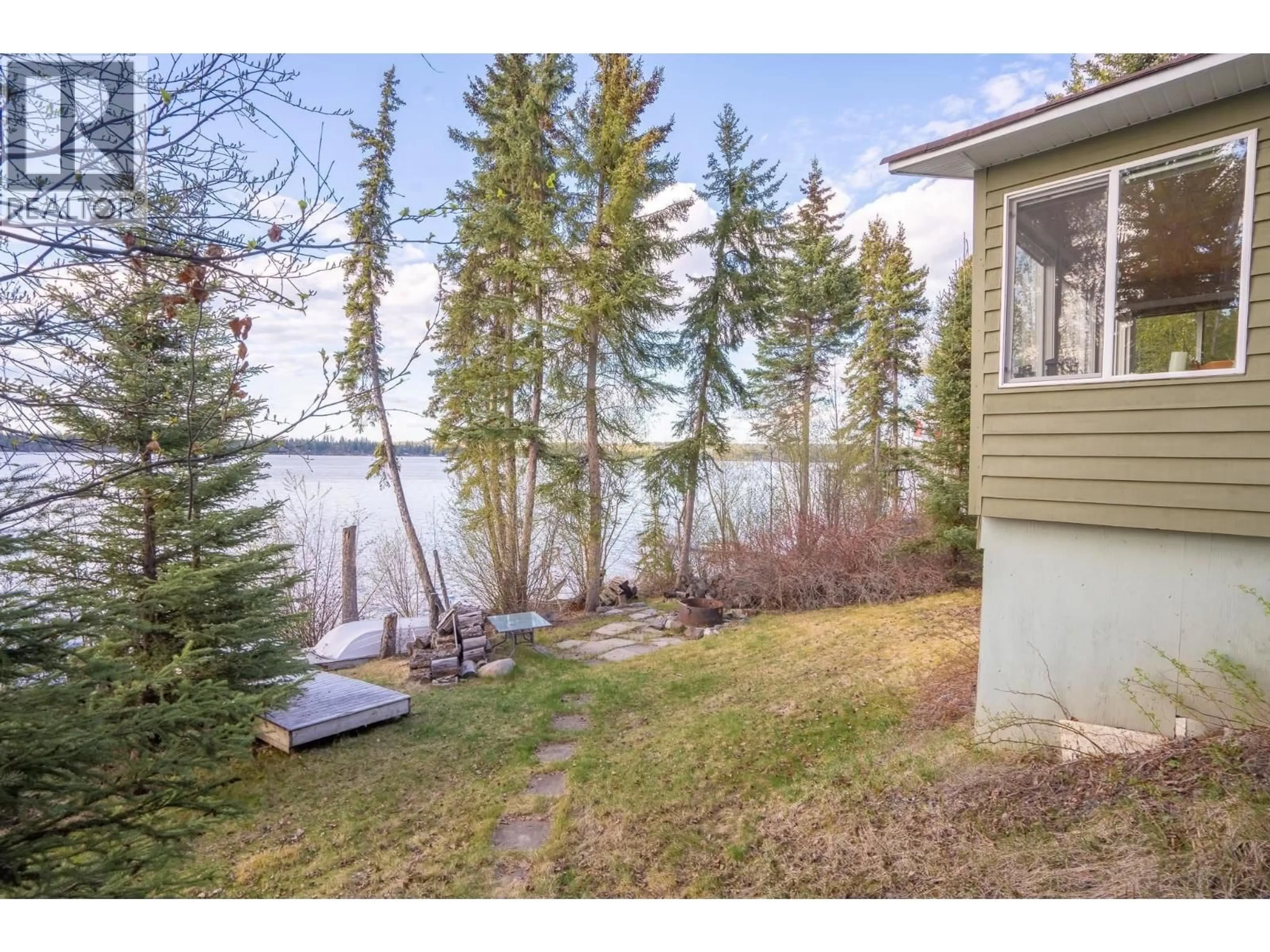 Patio, water/lake/river/ocean view for 52200 LLOYD DRIVE, Cluculz Lake British Columbia V0J3A3
