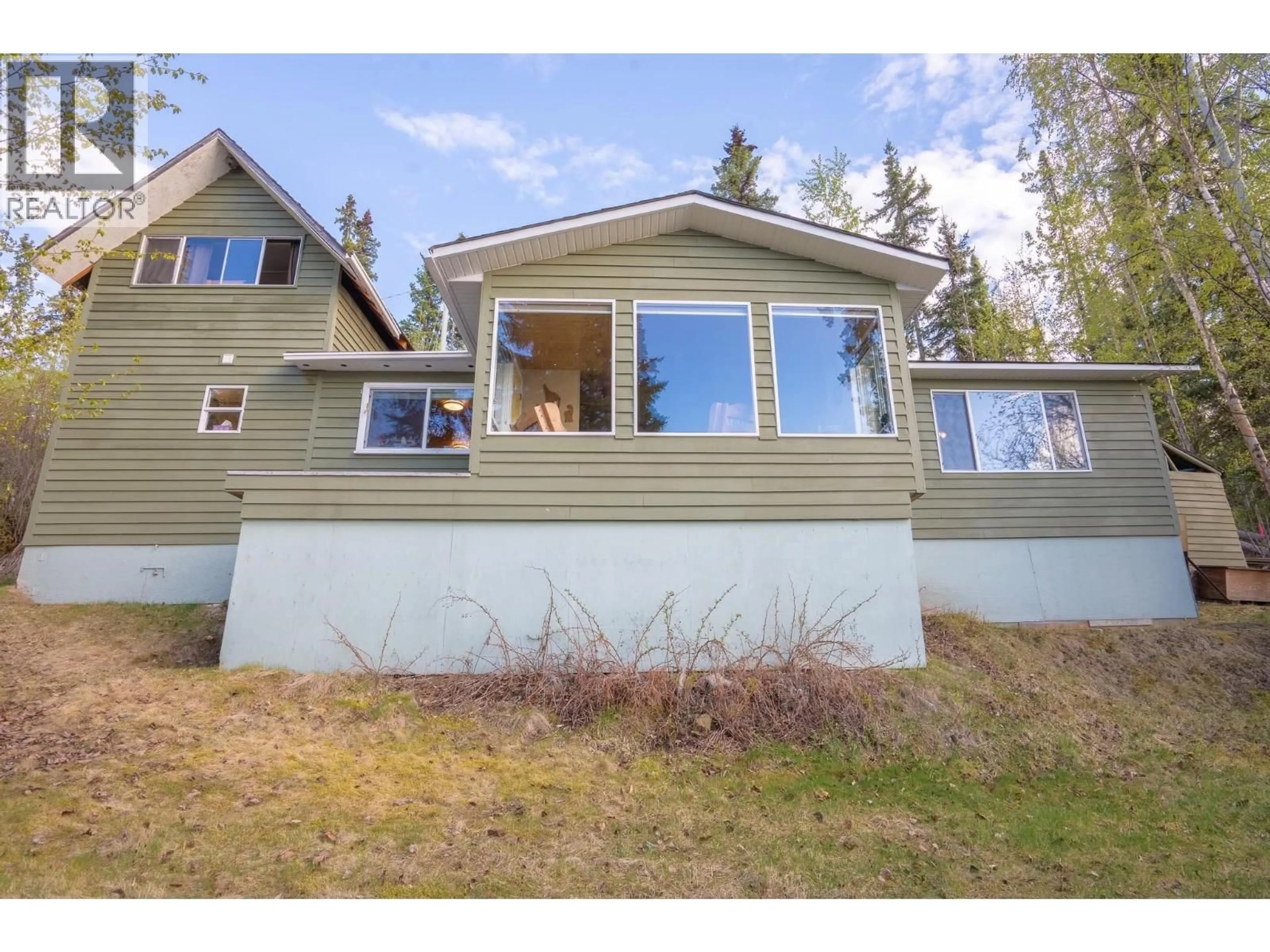 Home with vinyl exterior material, unknown for 52200 LLOYD DRIVE, Cluculz Lake British Columbia V0J3A3