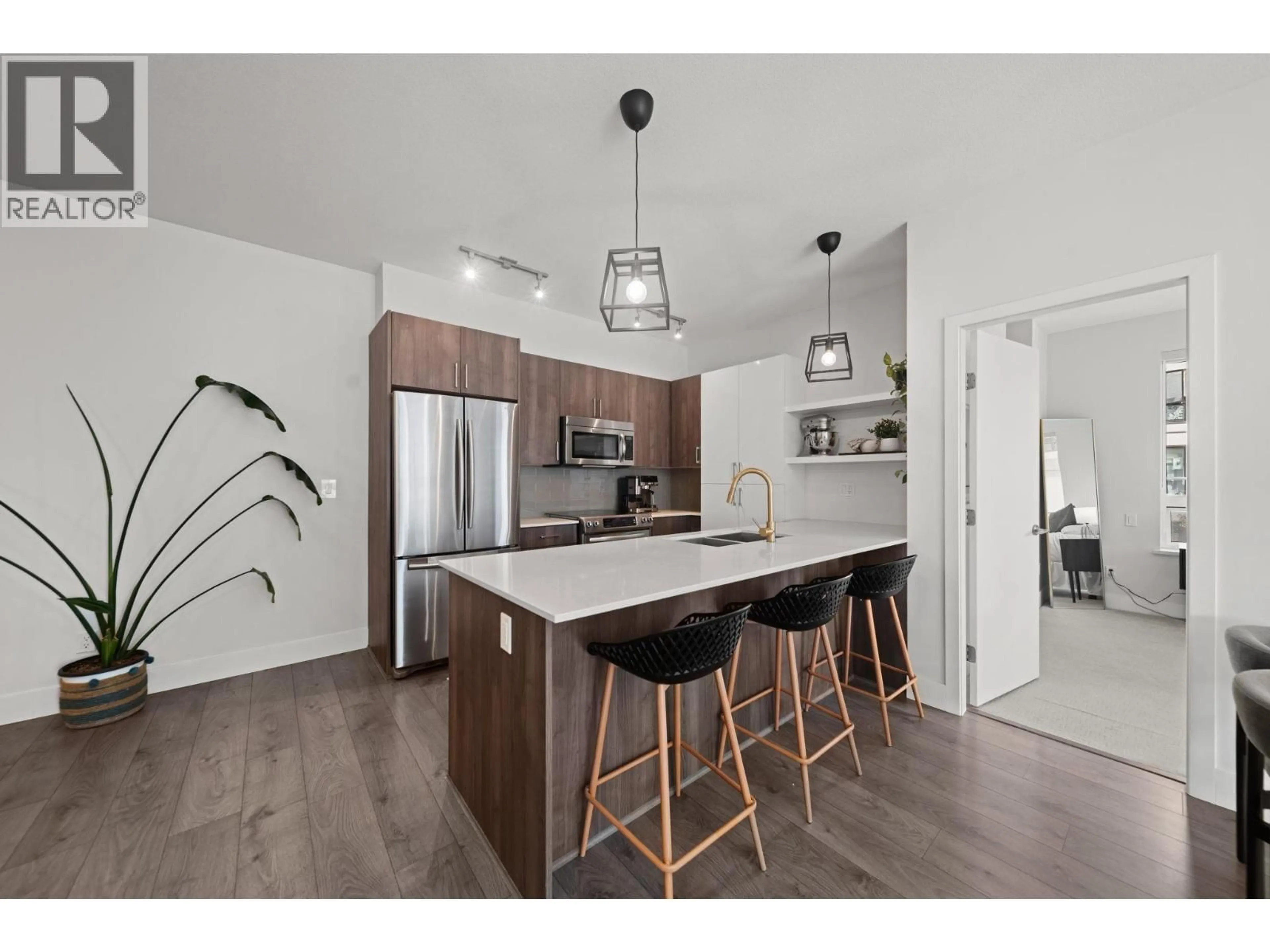 Open concept kitchen, unknown for 405 - 630 COMO LAKE AVENUE, Coquitlam British Columbia V3J0E4
