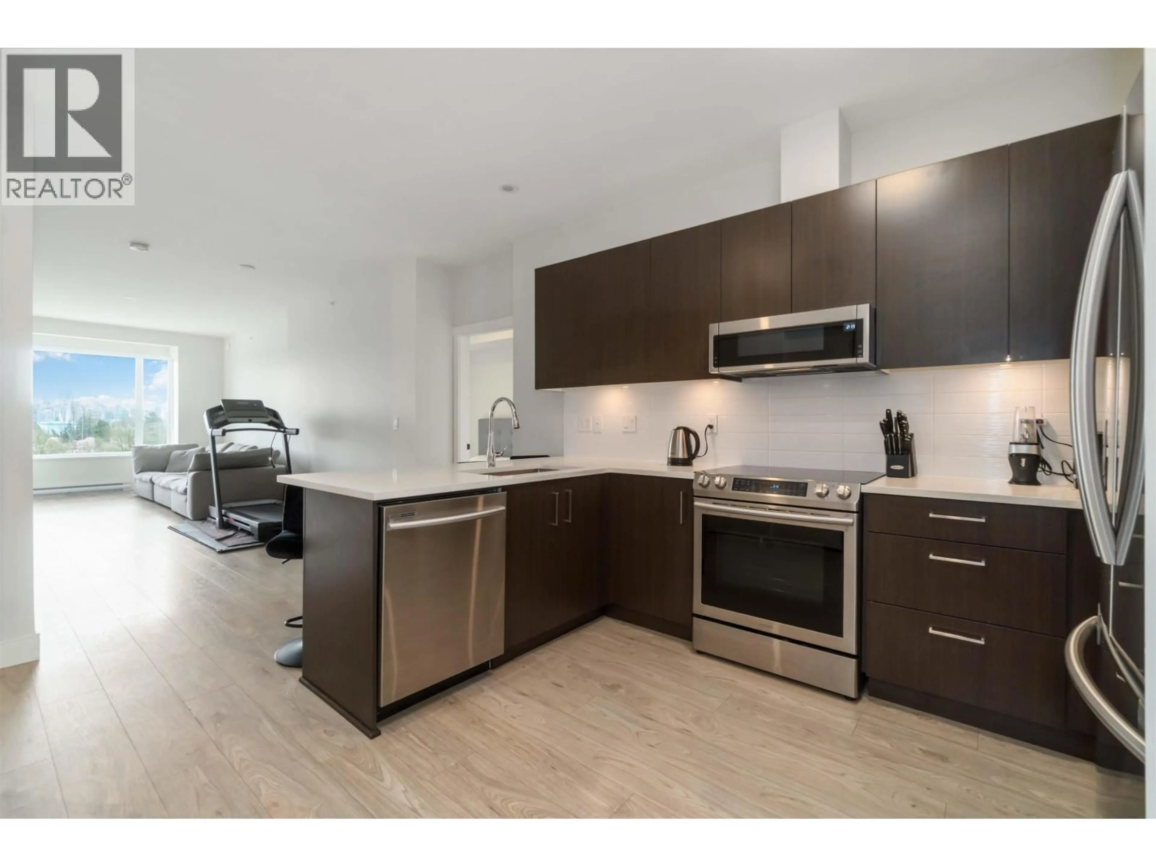 Open concept kitchen, unknown for 409 - 1633 TATLOW AVENUE, North Vancouver British Columbia V7P2Z8