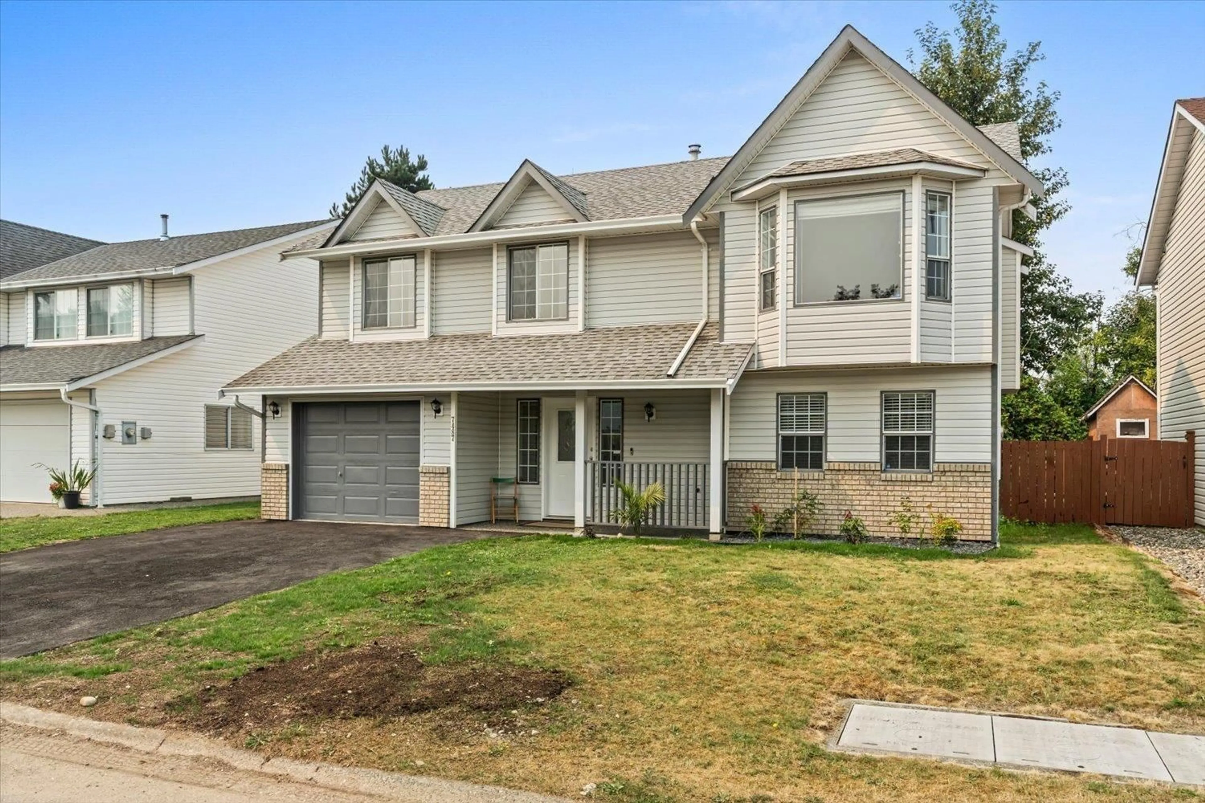 Home with vinyl exterior material, street for 7487 GARNET DRIVE, Chilliwack British Columbia V2R3B1