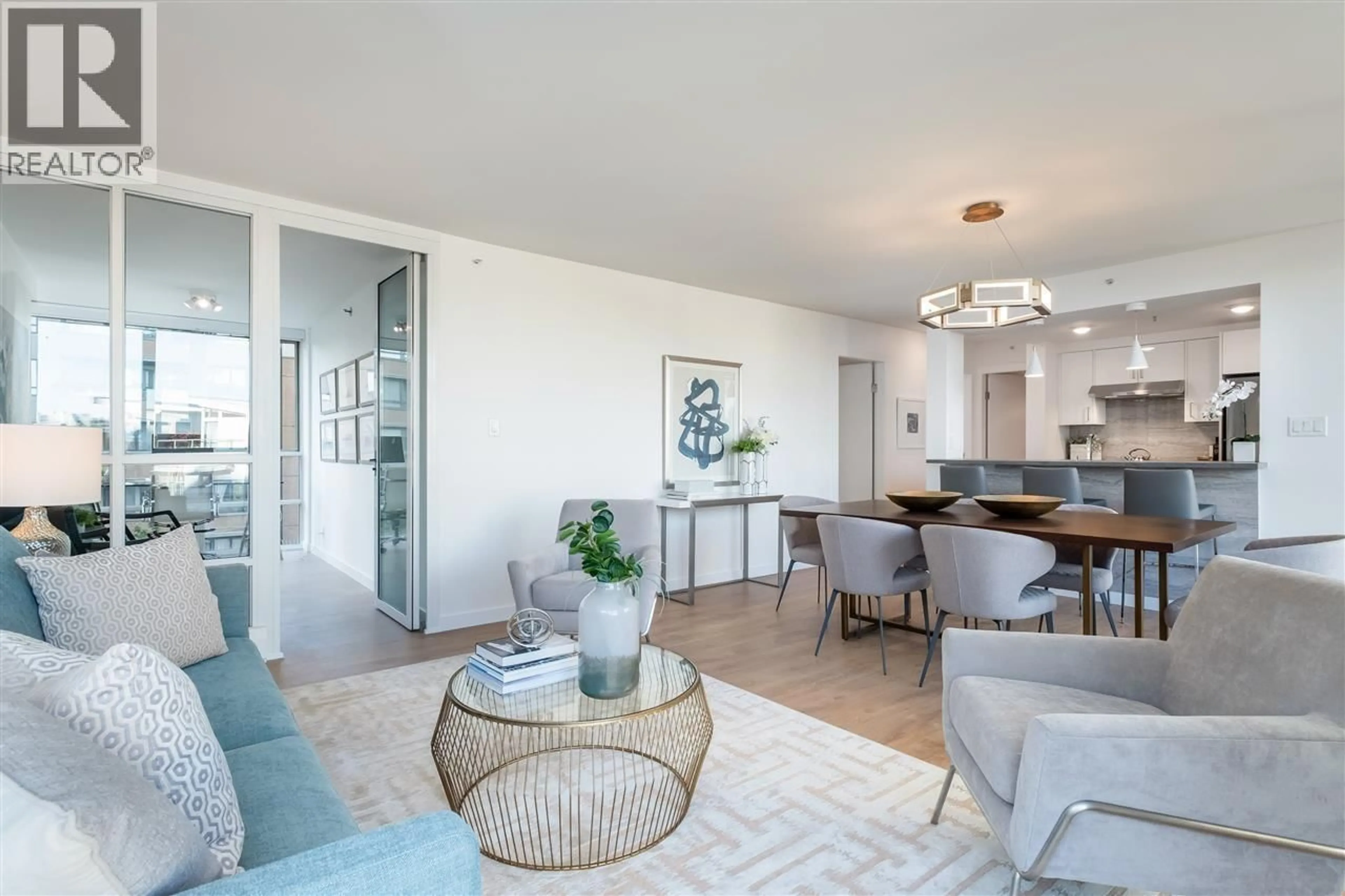 Living room with furniture, unknown for 605 - 1228 MARINASIDE CRESCENT, Vancouver British Columbia V6Z2W4
