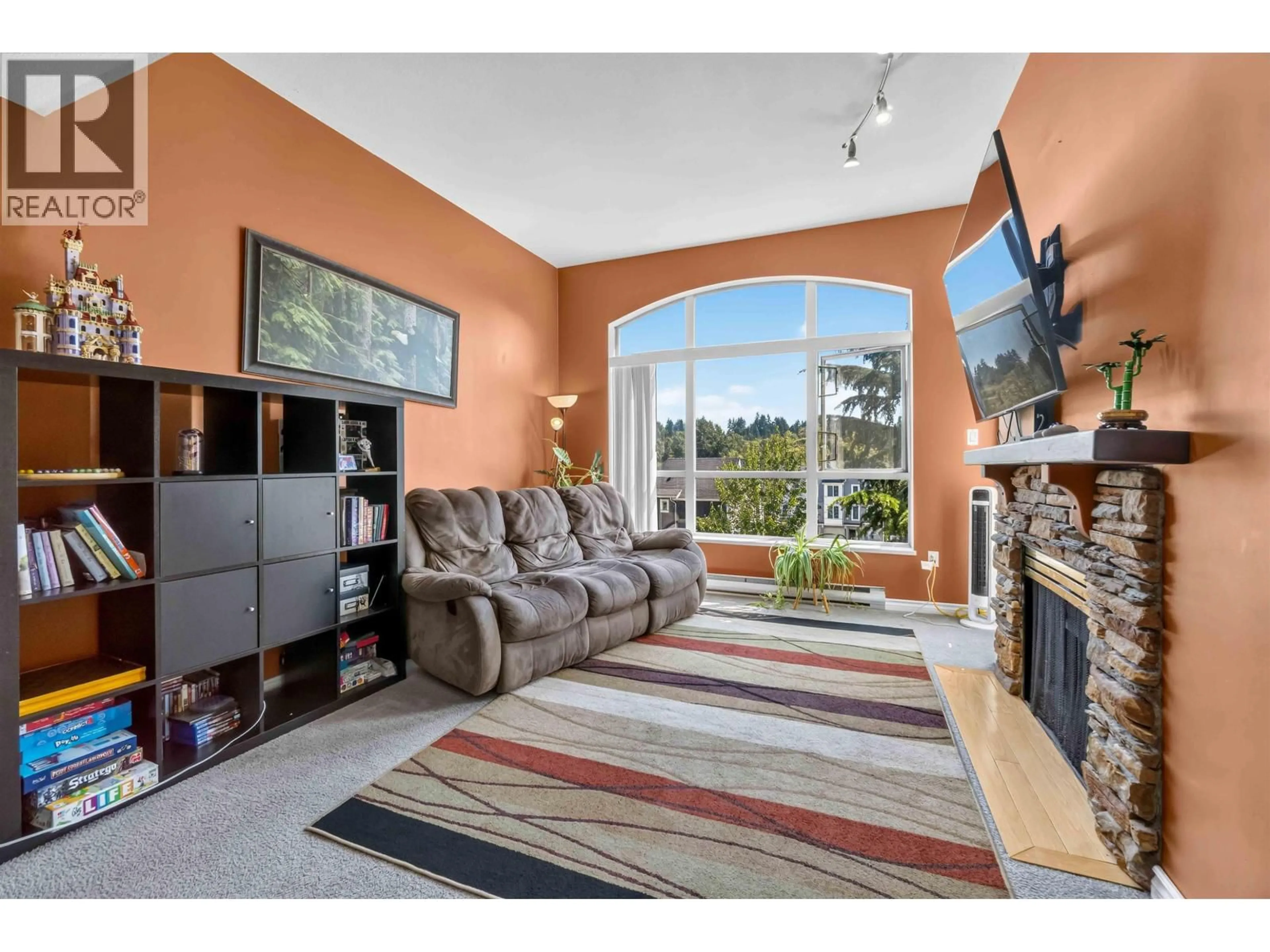 Living room with furniture, unknown for 422 - 2551 PARKVIEW LANE, Port Coquitlam British Columbia V3C6J8