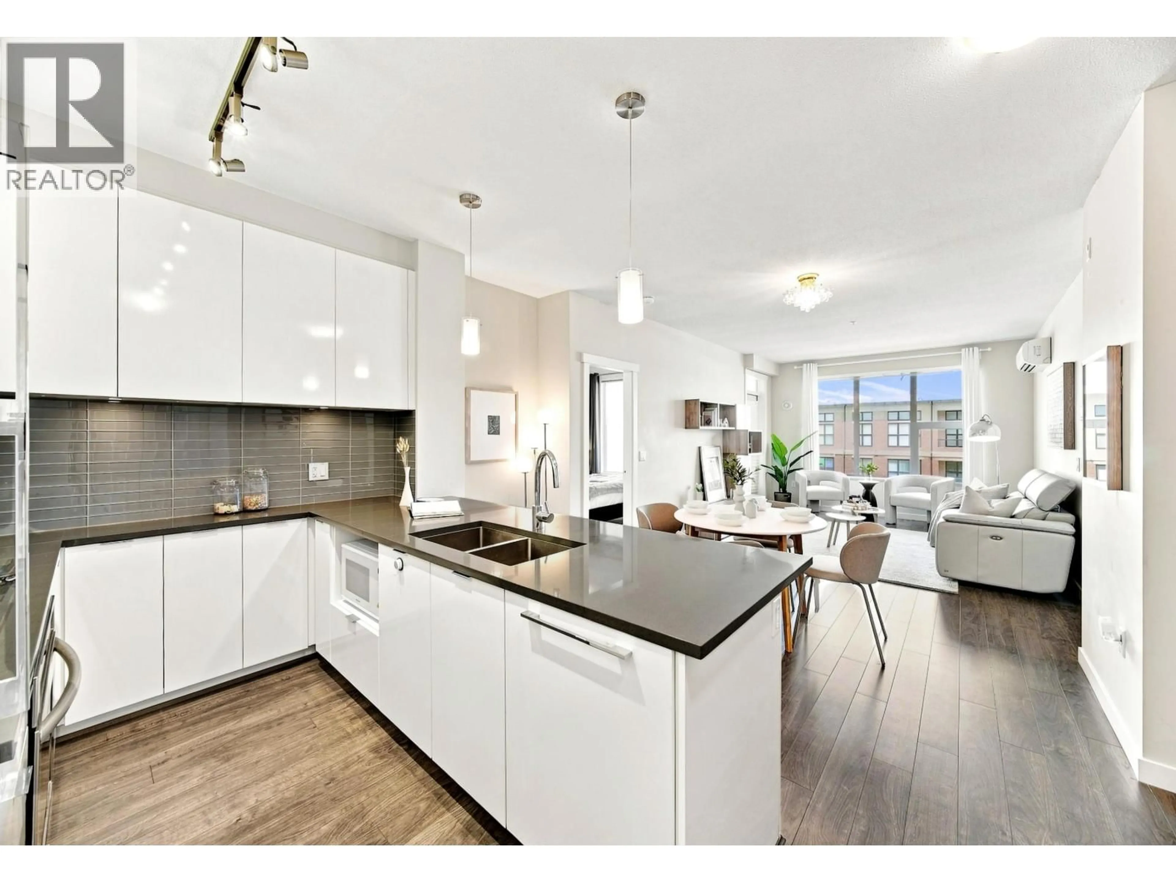 Open concept kitchen, unknown for 410 - 9399 ALEXANDRA ROAD, Richmond British Columbia V6X0L7