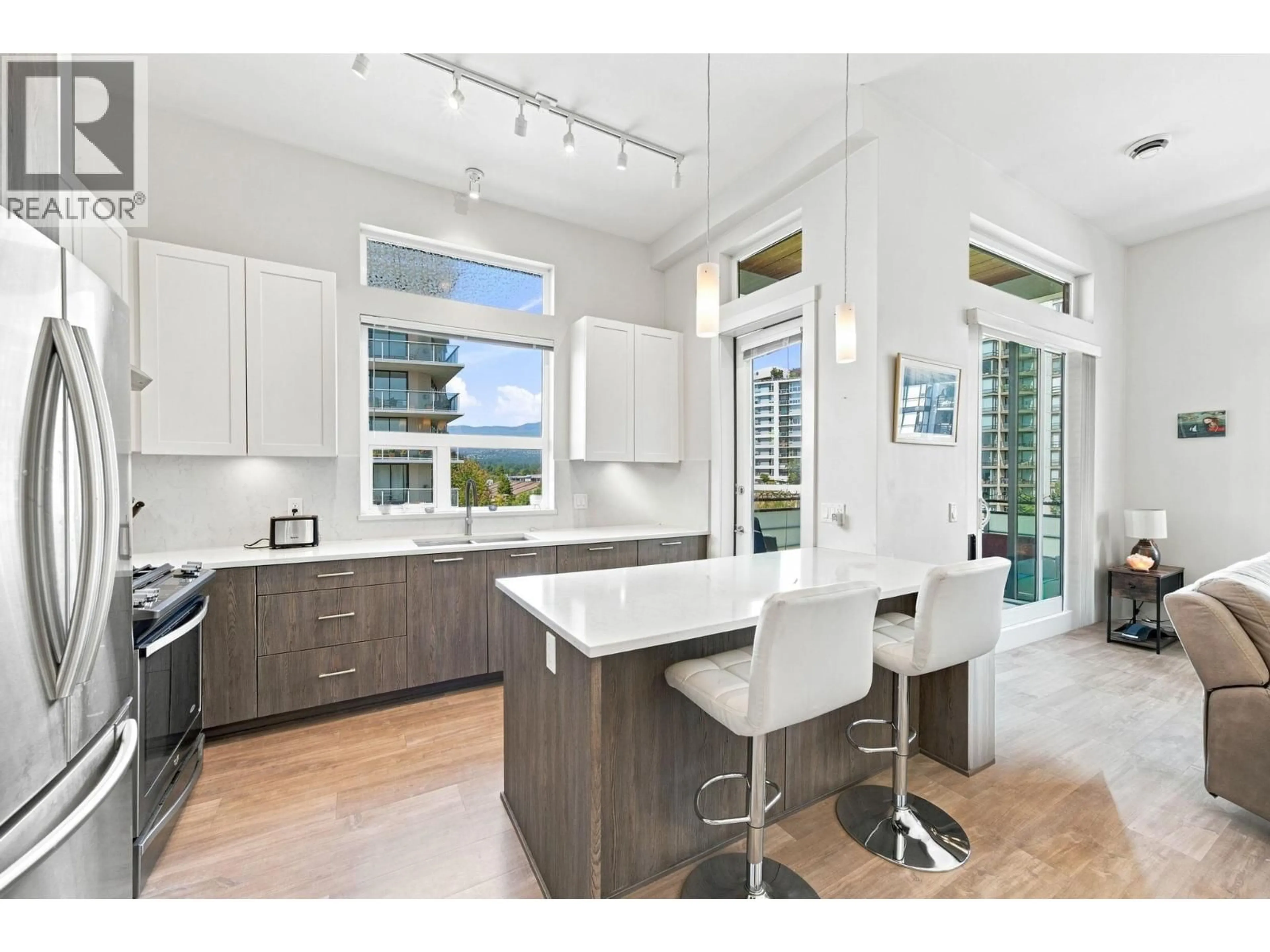 Open concept kitchen, ceramic/tile floor for 606 - 123 1ST STREET, North Vancouver British Columbia V7M0E5