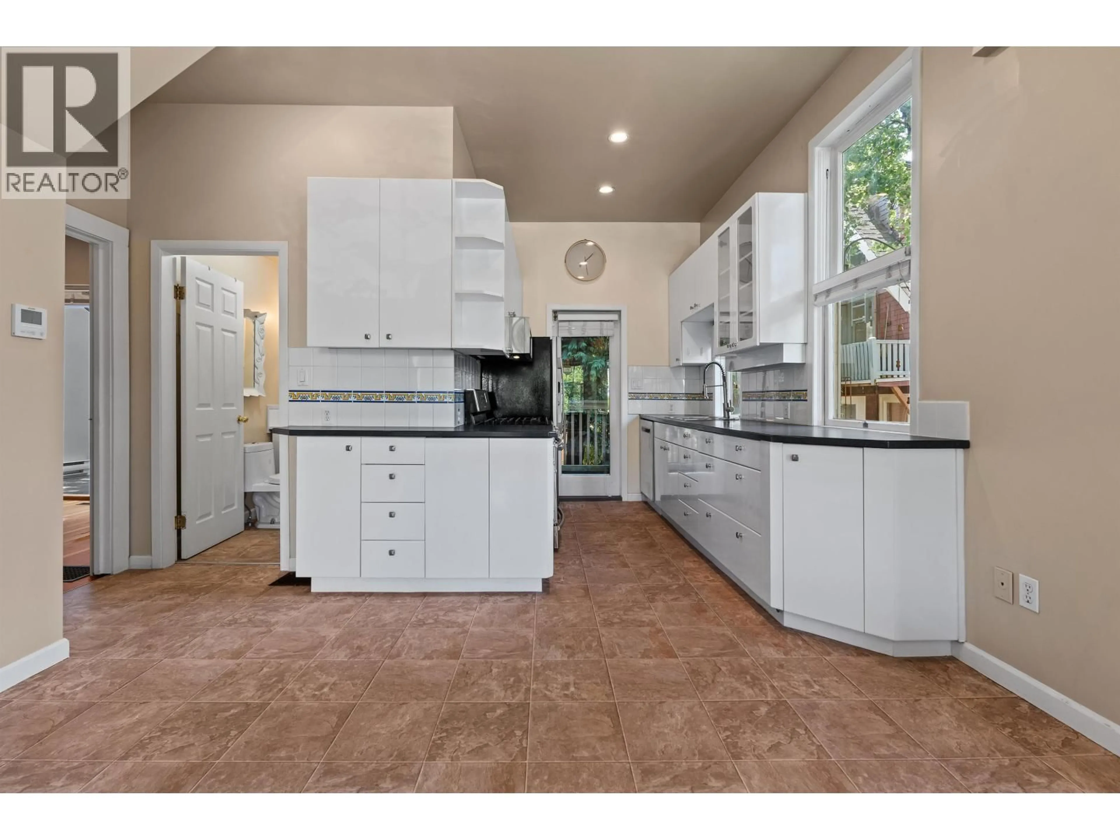 Open concept kitchen, ceramic/tile floor for 2656 3RD AVENUE, Vancouver British Columbia V6K1M3