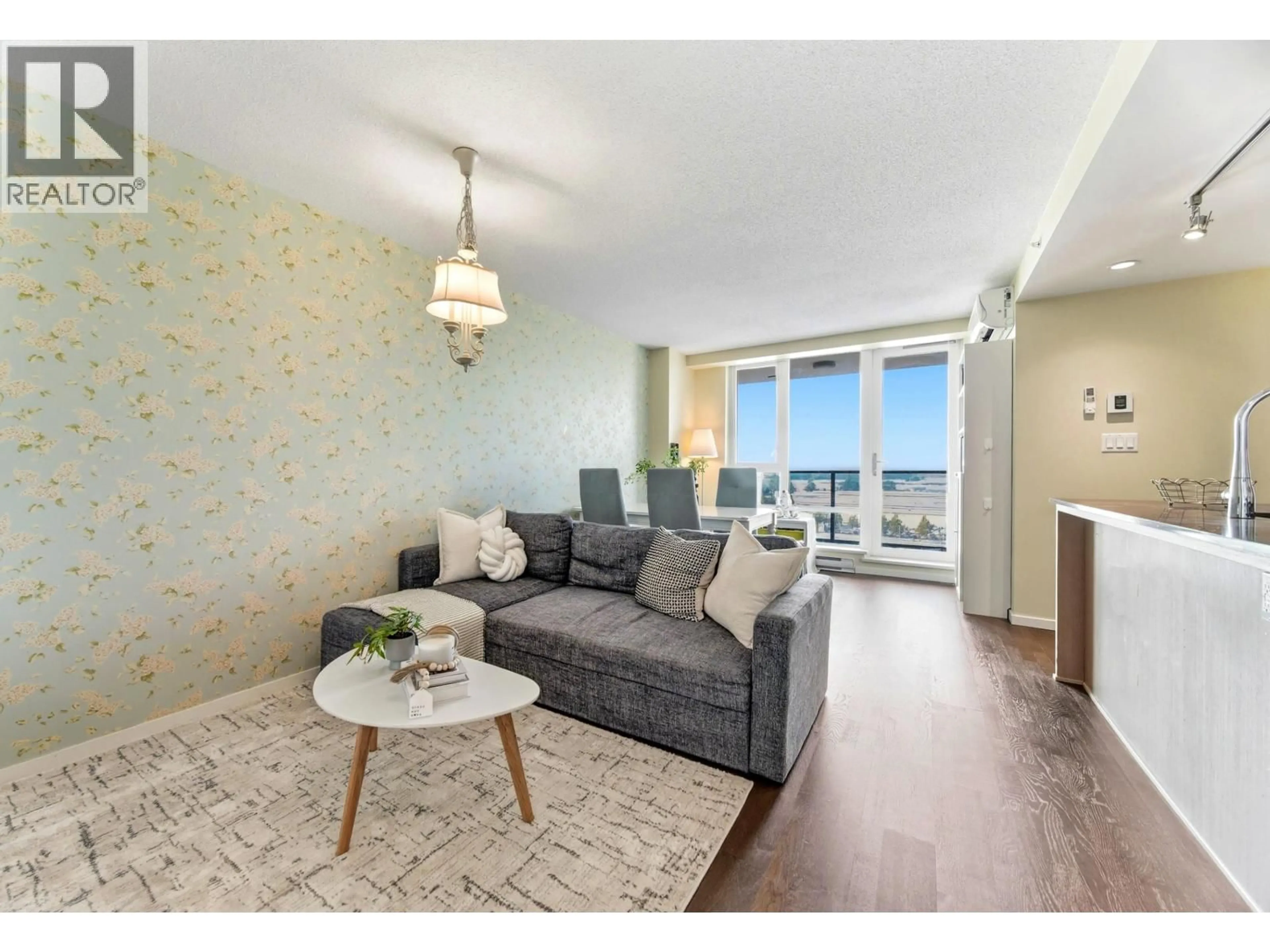 Living room with furniture, wood/laminate floor for 1209 - 7888 ACKROYD ROAD, Richmond British Columbia V6X0M9