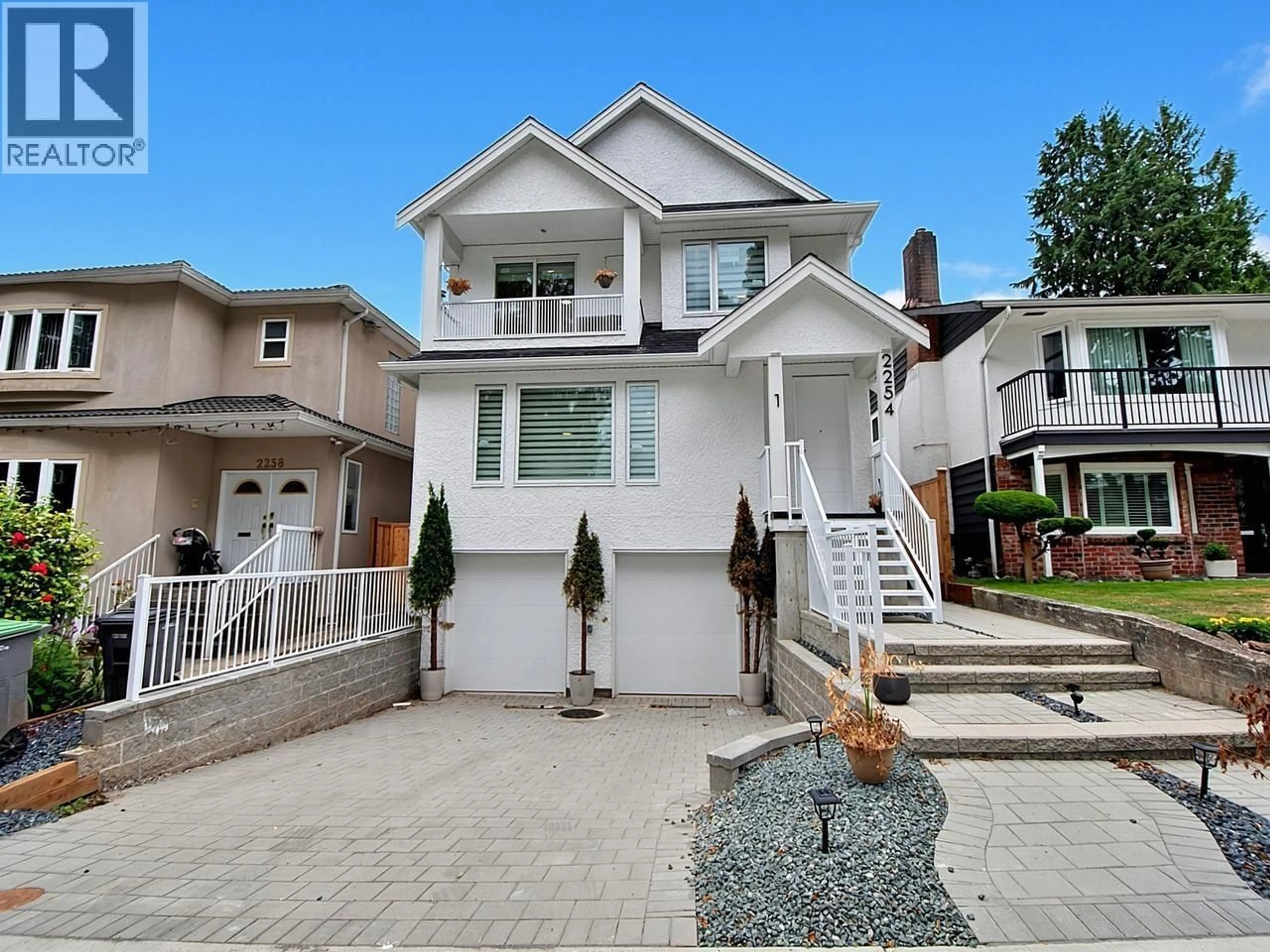 Home with vinyl exterior material, street for 1 - 2254 24TH AVENUE, Vancouver British Columbia V5N2V2