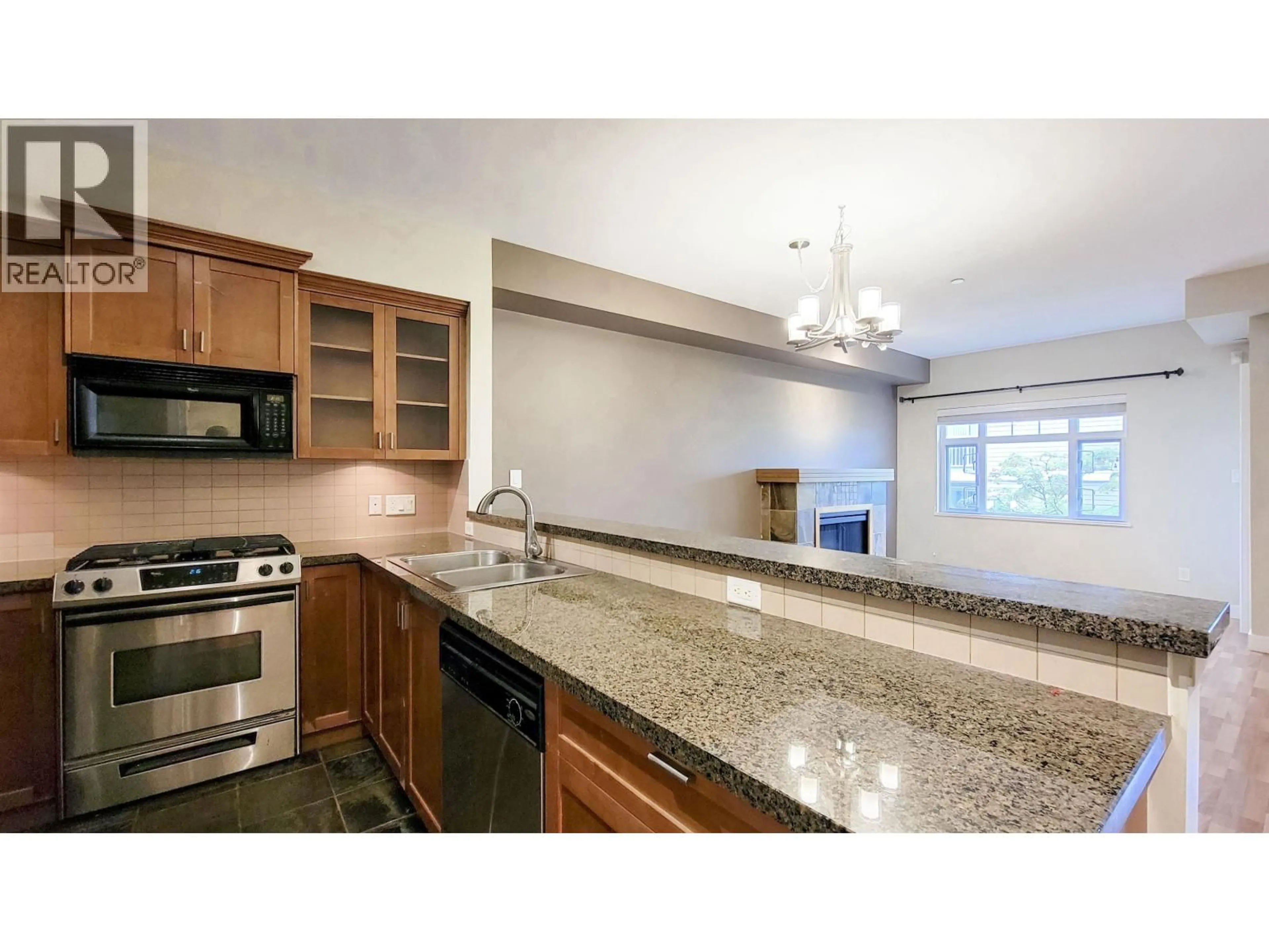 Open concept kitchen, ceramic/tile floor for 74 - 7388 MACPHERSON AVENUE, Burnaby British Columbia V5J0A1