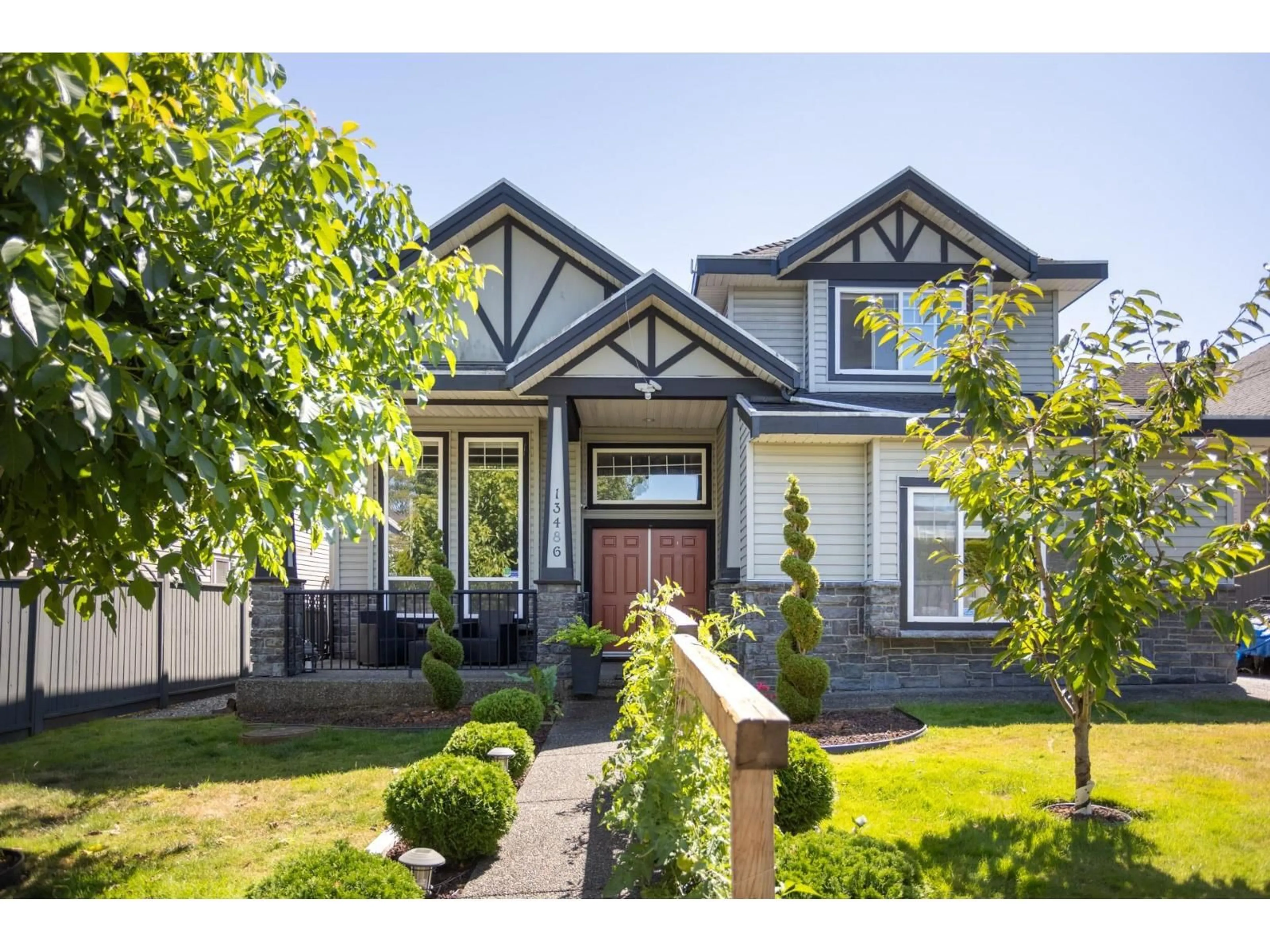 Home with vinyl exterior material, street for 13486 64 AVENUE, Surrey British Columbia V3W1Y3