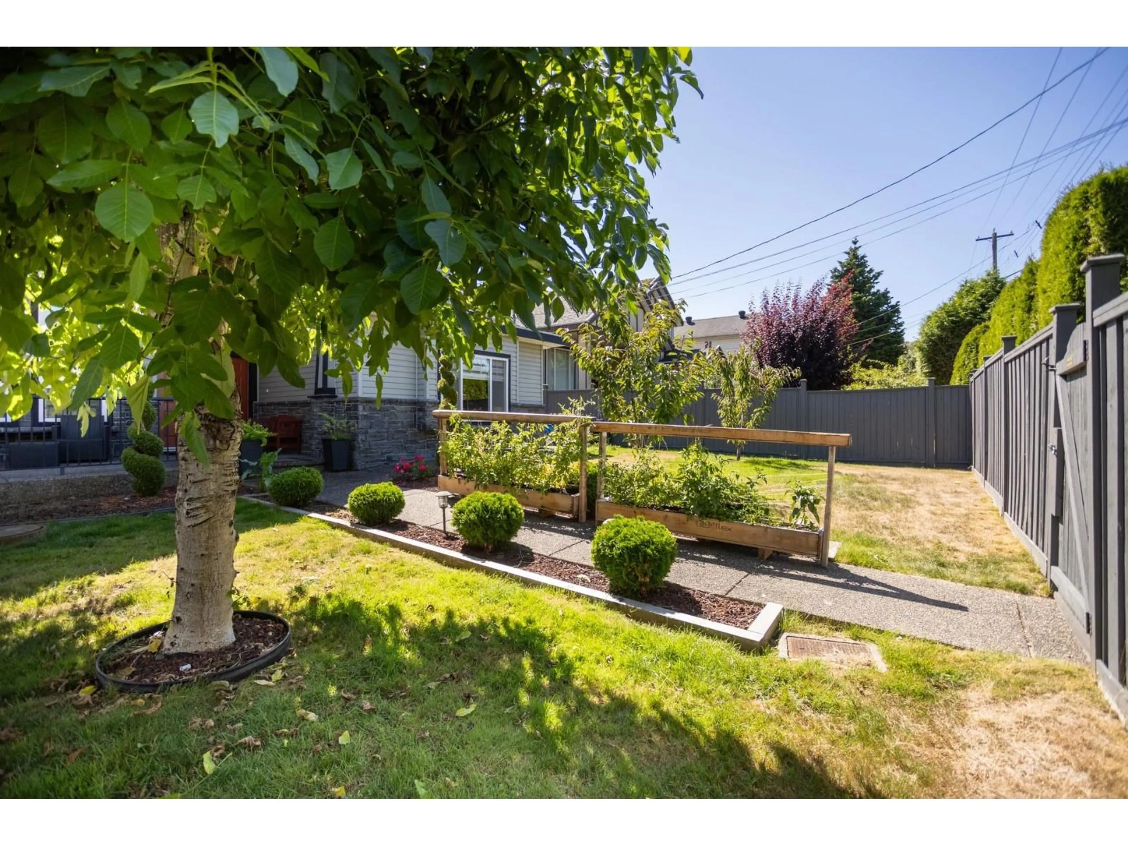 A pic from outside/outdoor area/front of a property/back of a property/a pic from drone, street for 13486 64 AVENUE, Surrey British Columbia V3W1Y3