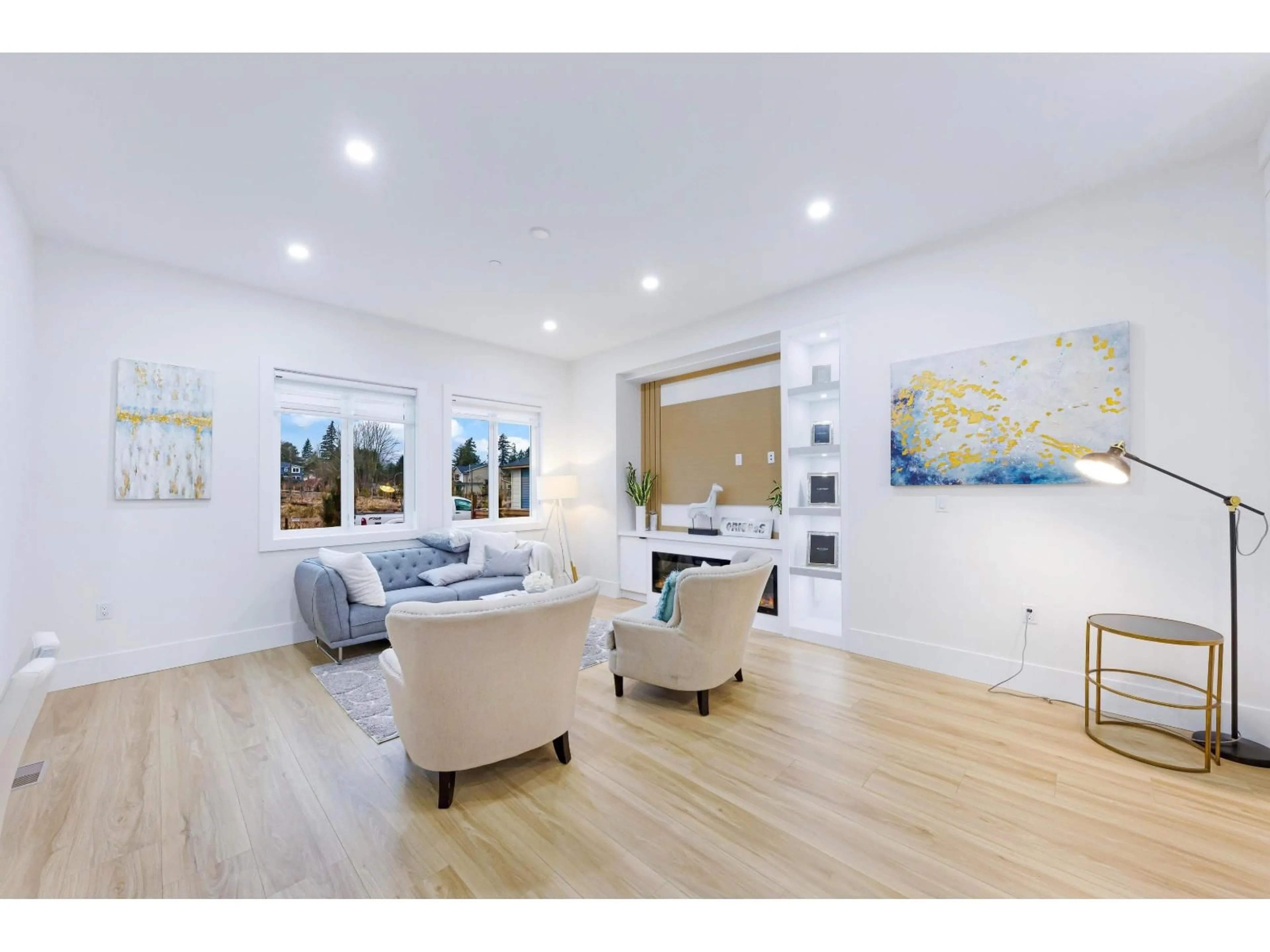 Living room with furniture, wood/laminate floor for 7771 197 STREET, Langley British Columbia V2Y3V5