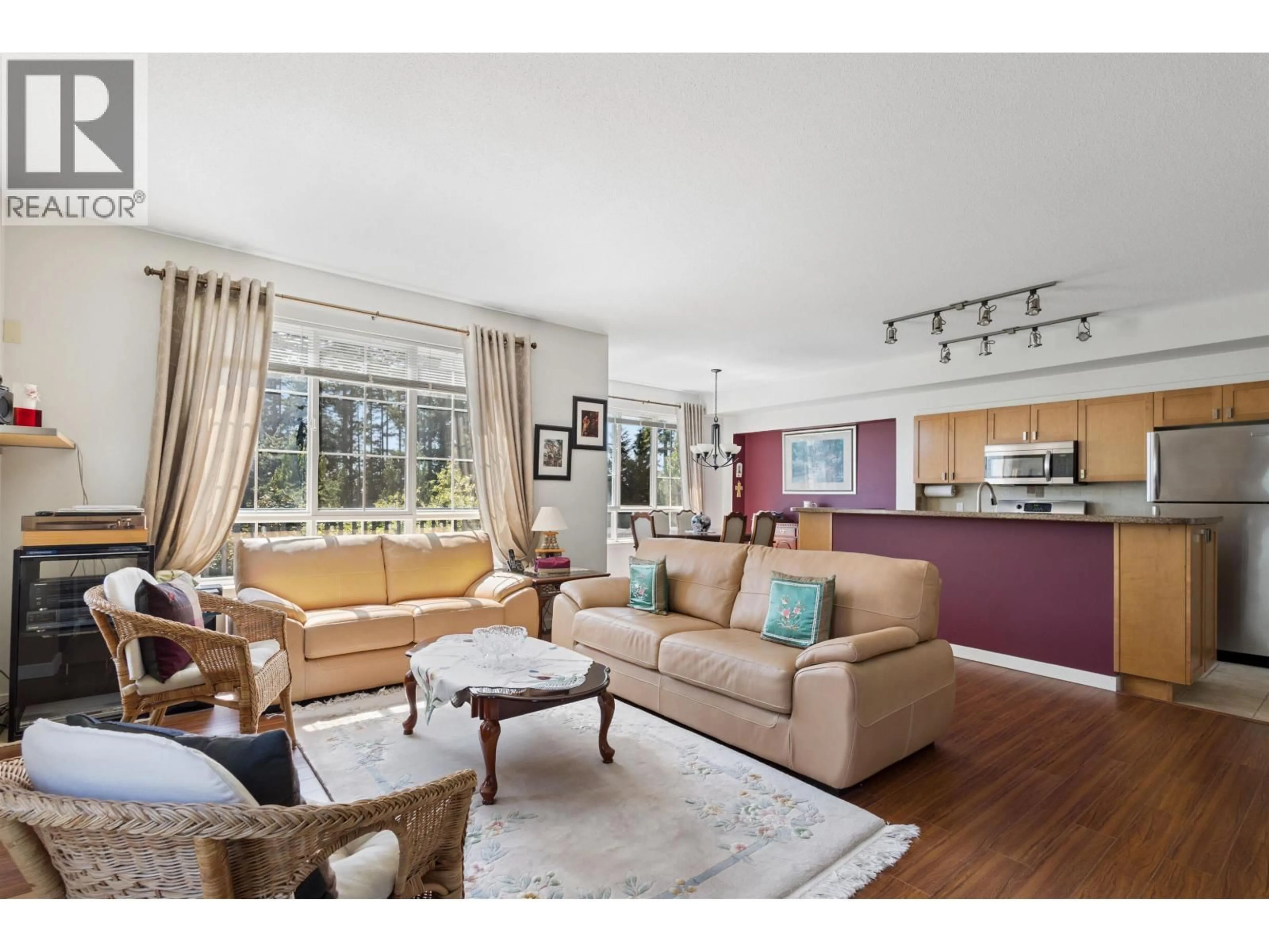 Living room with furniture, wood/laminate floor for 126 - 2200 PANORAMA DRIVE, Port Moody British Columbia V3H5M2