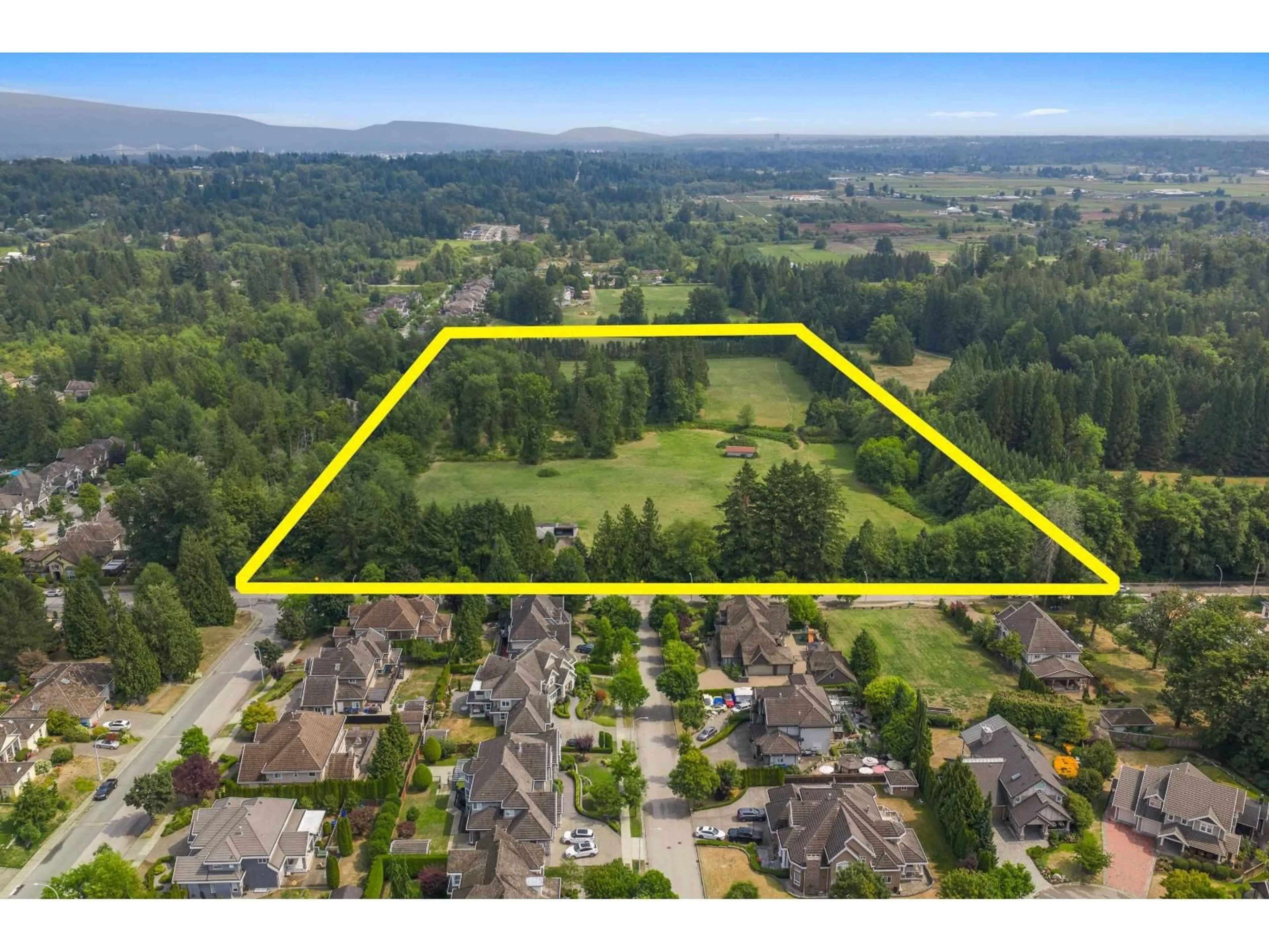 A pic from outside/outdoor area/front of a property/back of a property/a pic from drone, mountain view for 9186 164 STREET, Surrey British Columbia V4N2Z8
