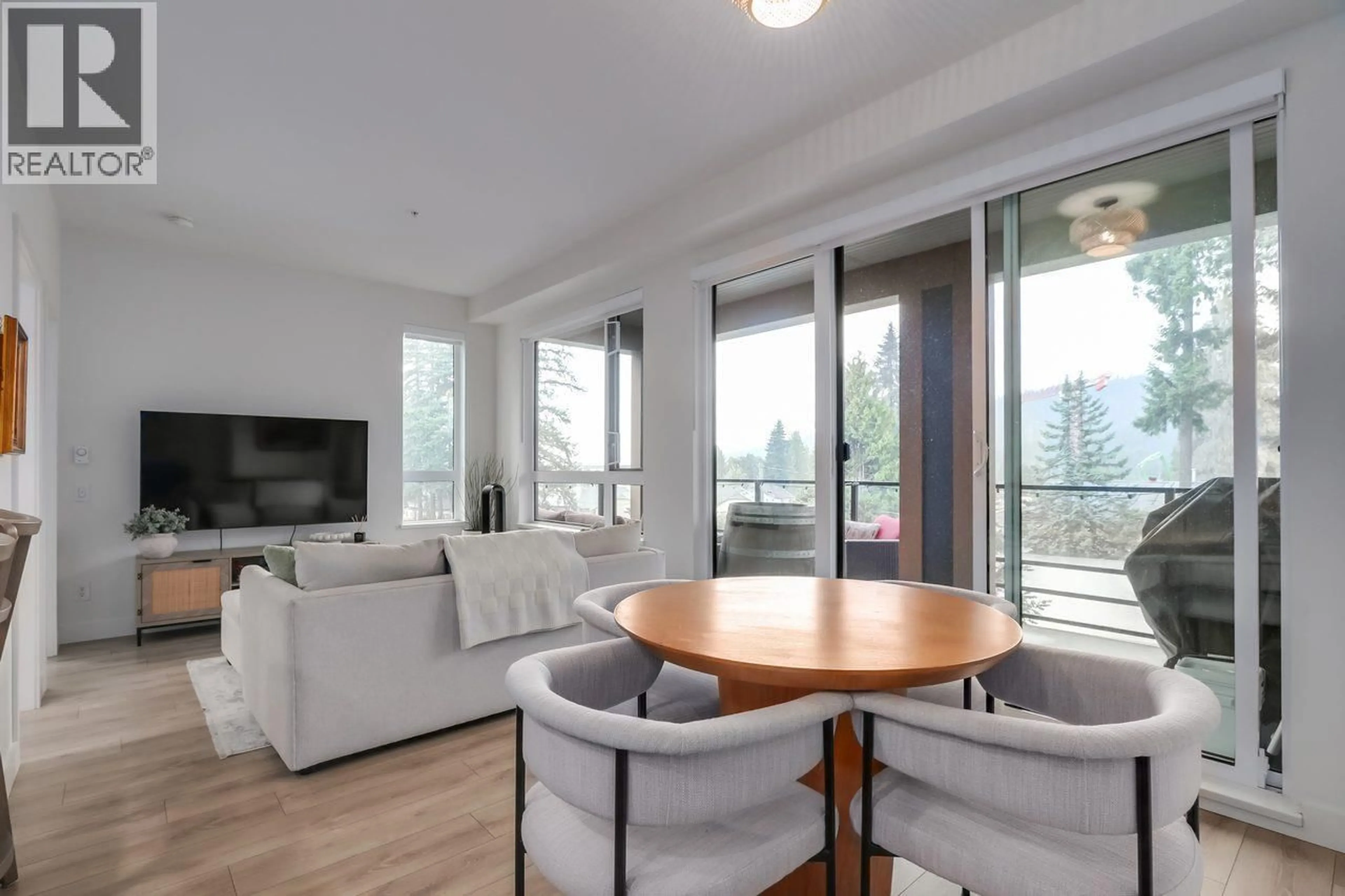 Living room with furniture, wood/laminate floor for 306 - 741 ANSKAR COURT, Coquitlam British Columbia V3J0N3