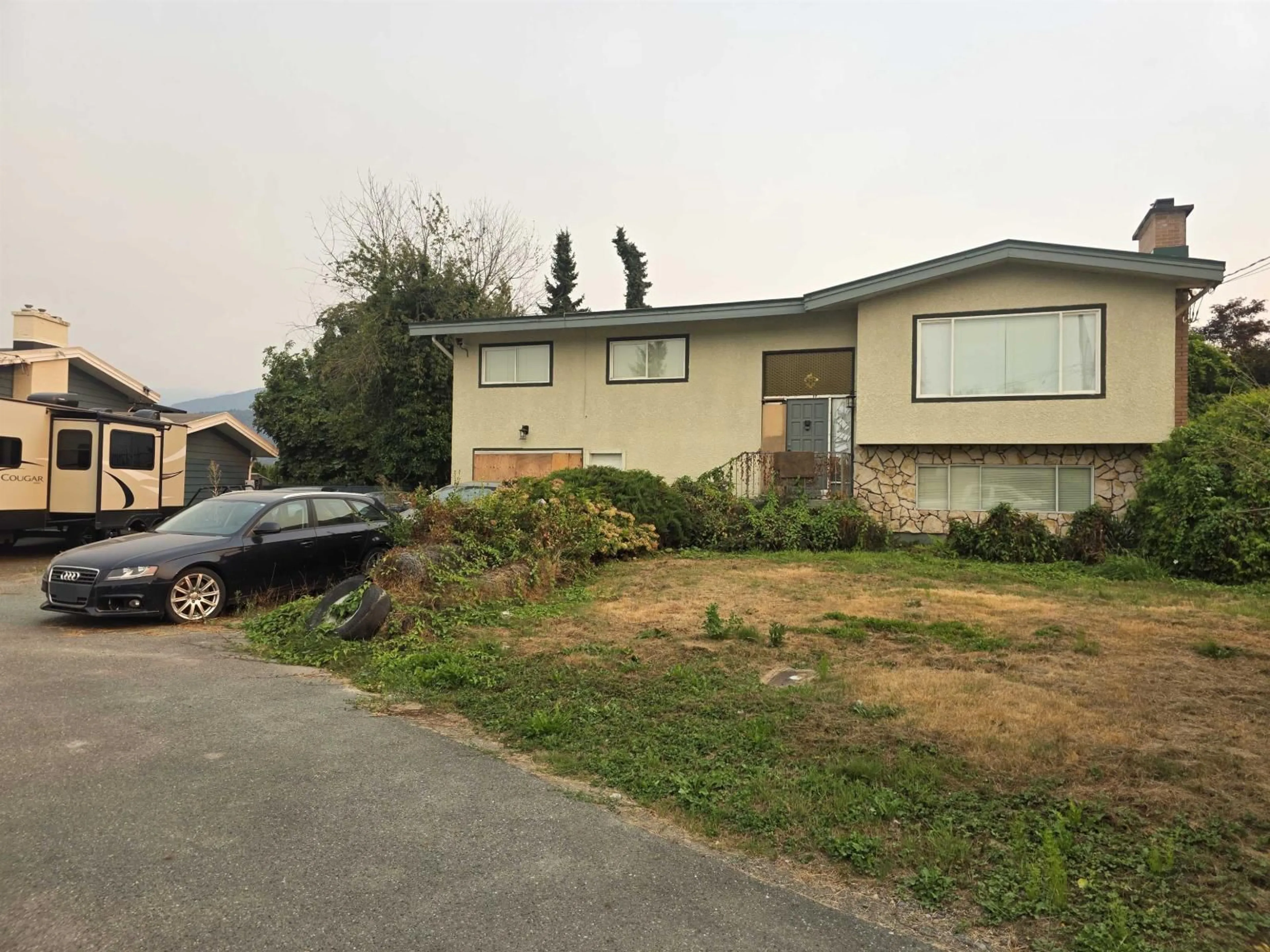 A pic from outside/outdoor area/front of a property/back of a property/a pic from drone, street for 42690 DOWNING ROAD, Chilliwack British Columbia V2R4P3