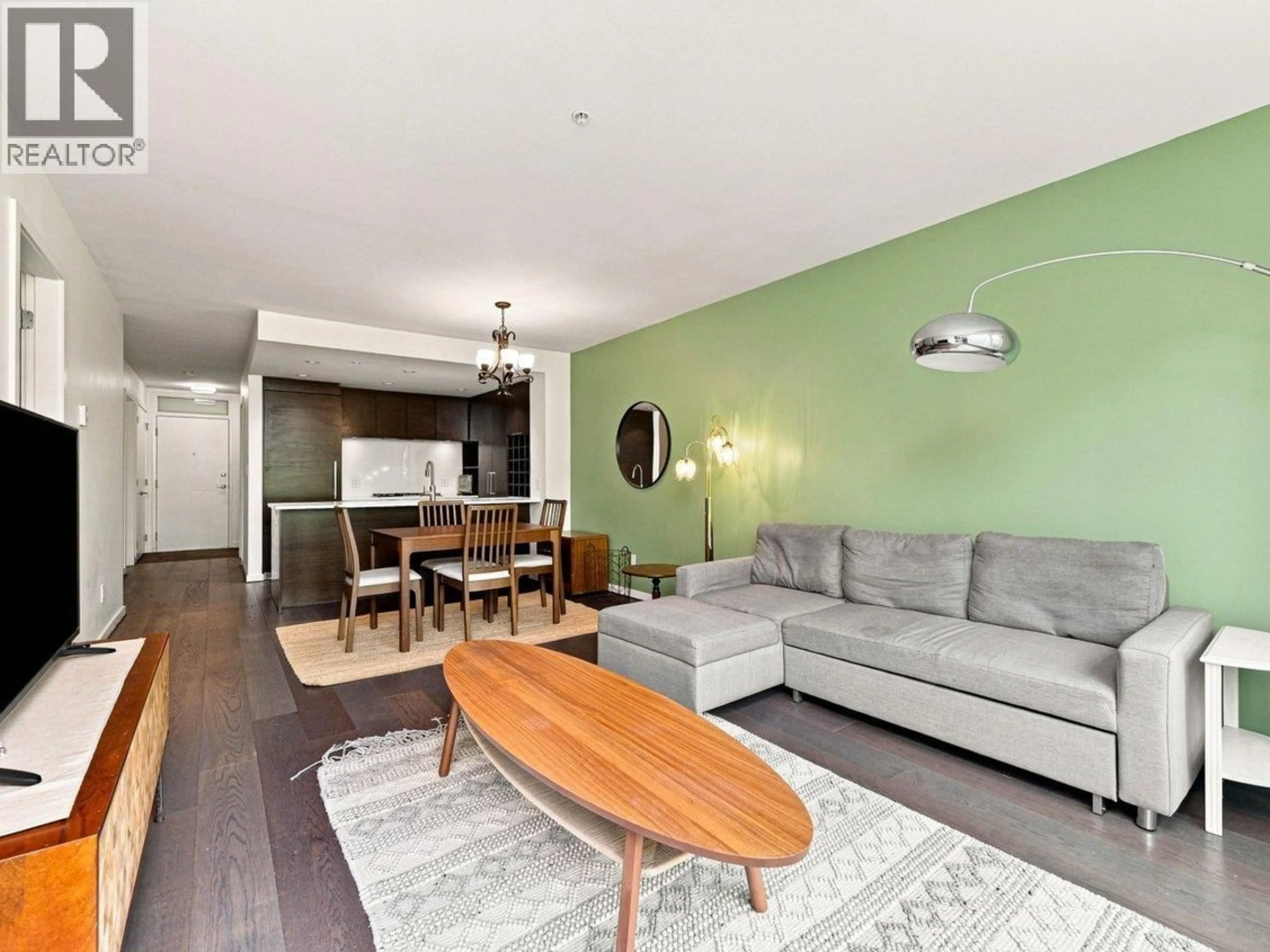 Living room with furniture, wood/laminate floor for 512 - 5955 BIRNEY AVENUE, Vancouver British Columbia V6S0C5
