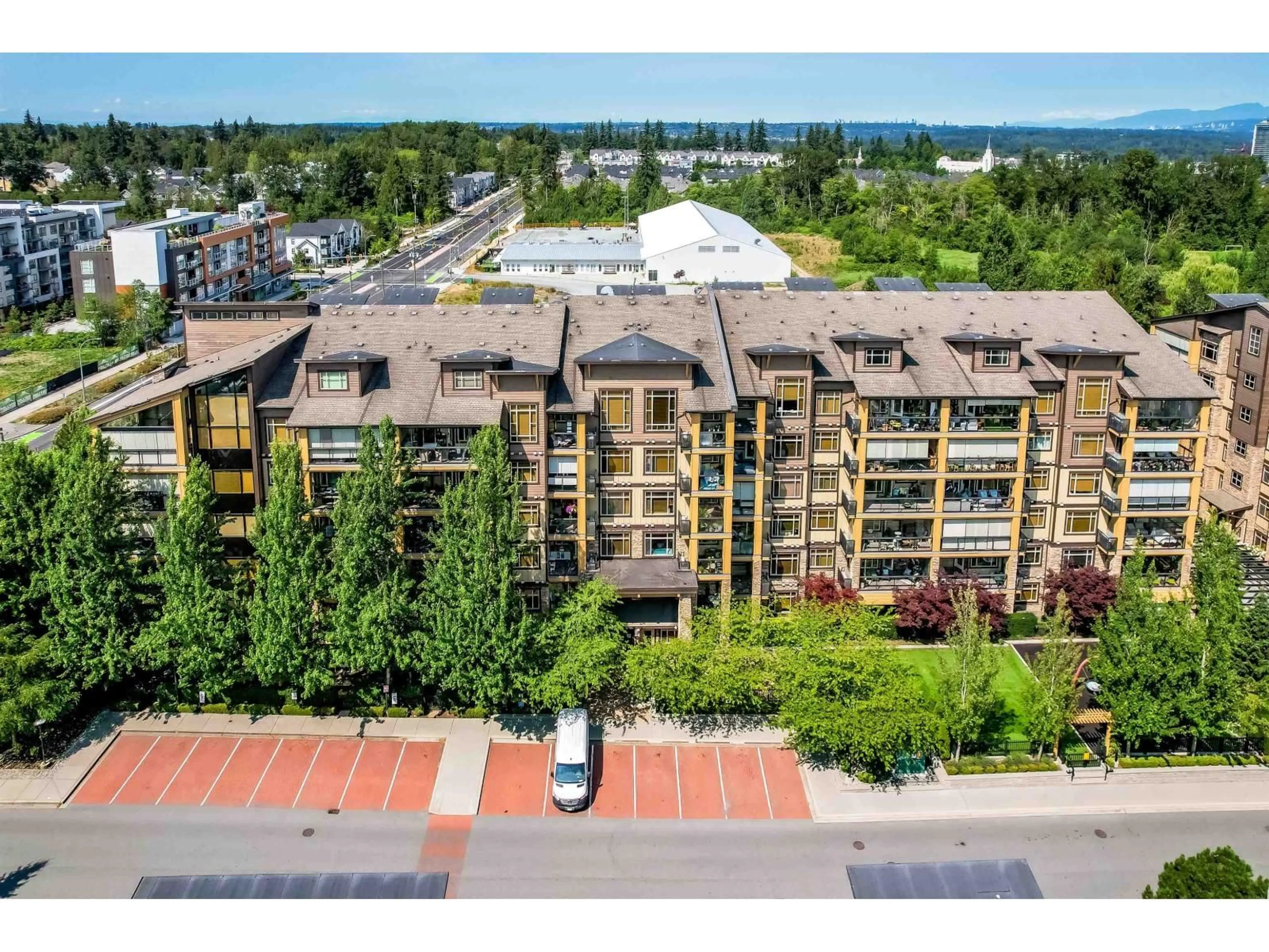 A pic from outside/outdoor area/front of a property/back of a property/a pic from drone, city buildings view from balcony for 301 - 8067 207 STREET, Langley British Columbia V2Y0N9