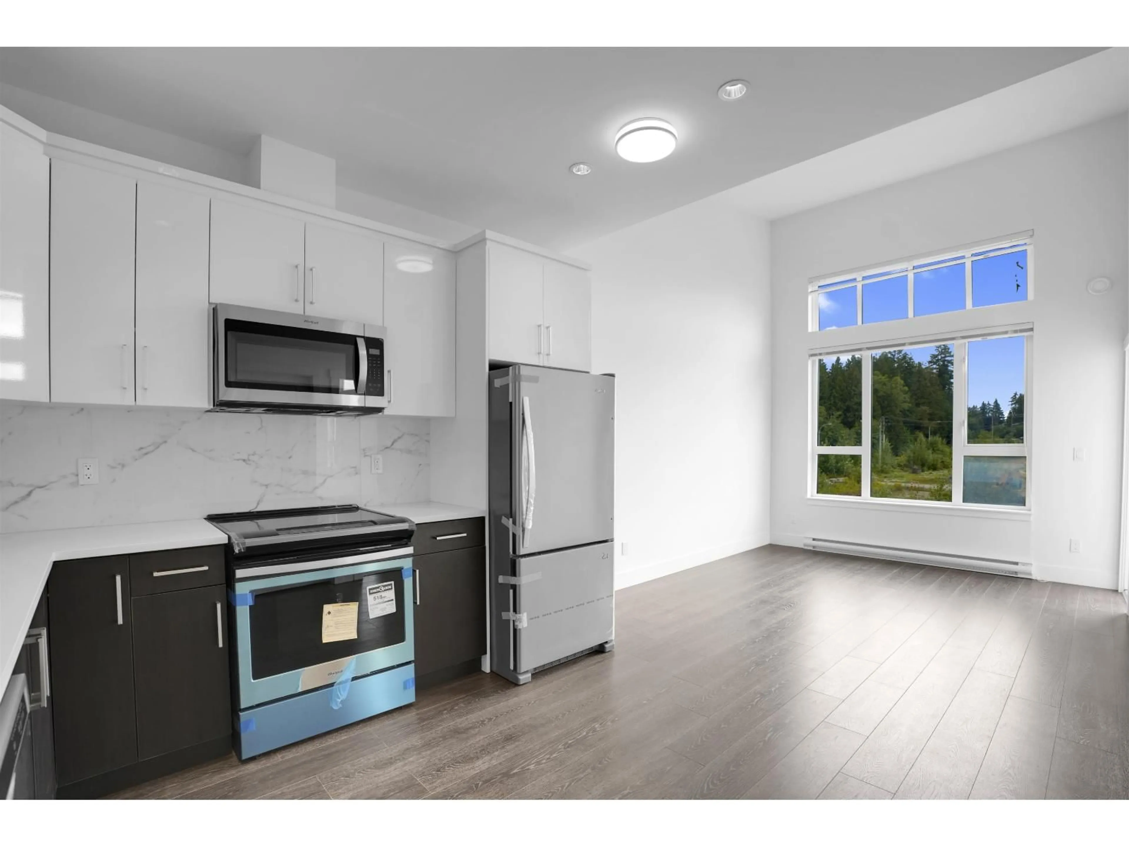 Open concept kitchen, unknown for 504 - 9983 BARNSTON DRIVE EAST, Surrey British Columbia V4N6T3