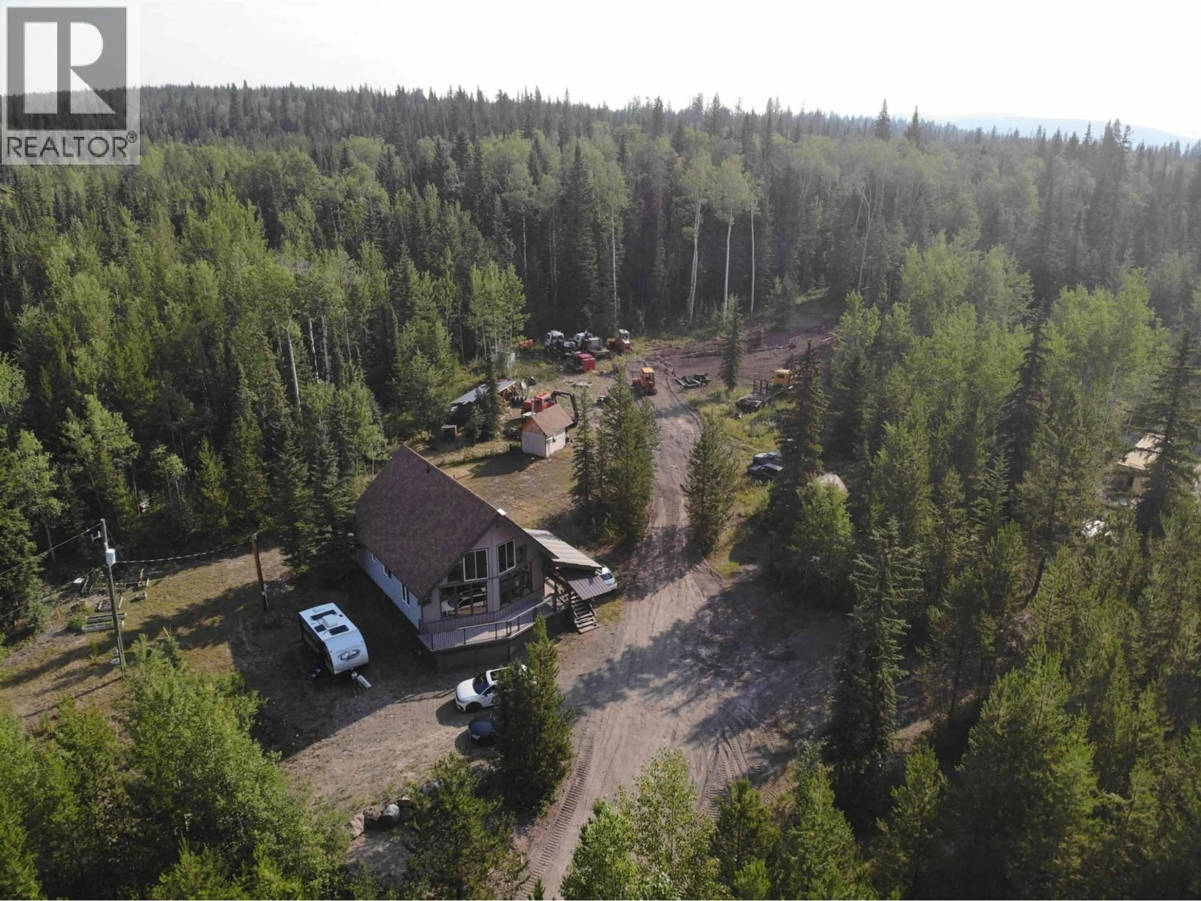 A pic from outside/outdoor area/front of a property/back of a property/a pic from drone, forest/trees view for 1020 RAINBOW ROAD, Quesnel British Columbia V2J3H9