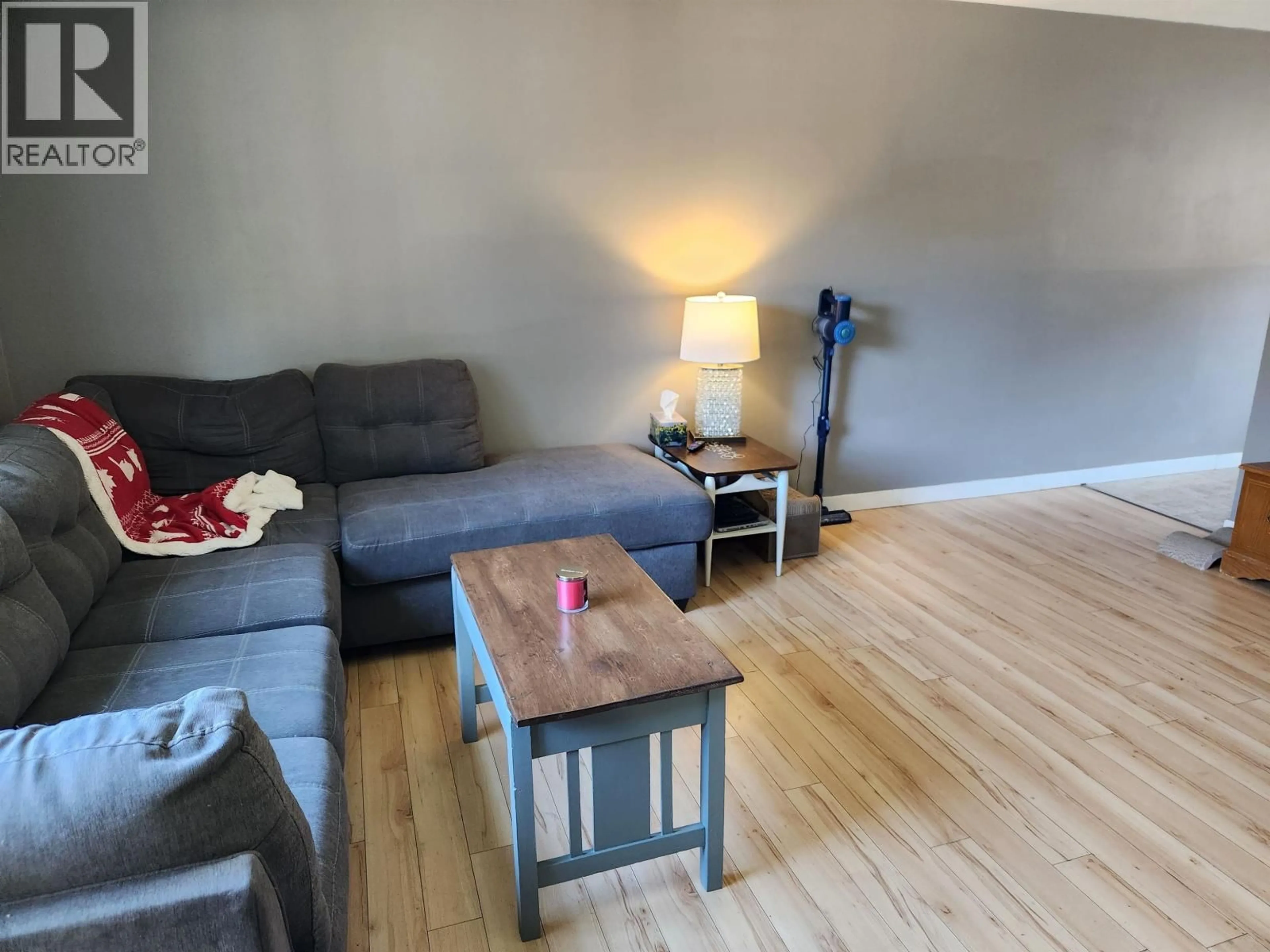 Living room with furniture, wood/laminate floor for G70 - 1900 STRATHCONA AVENUE, Prince George British Columbia V2L2V9
