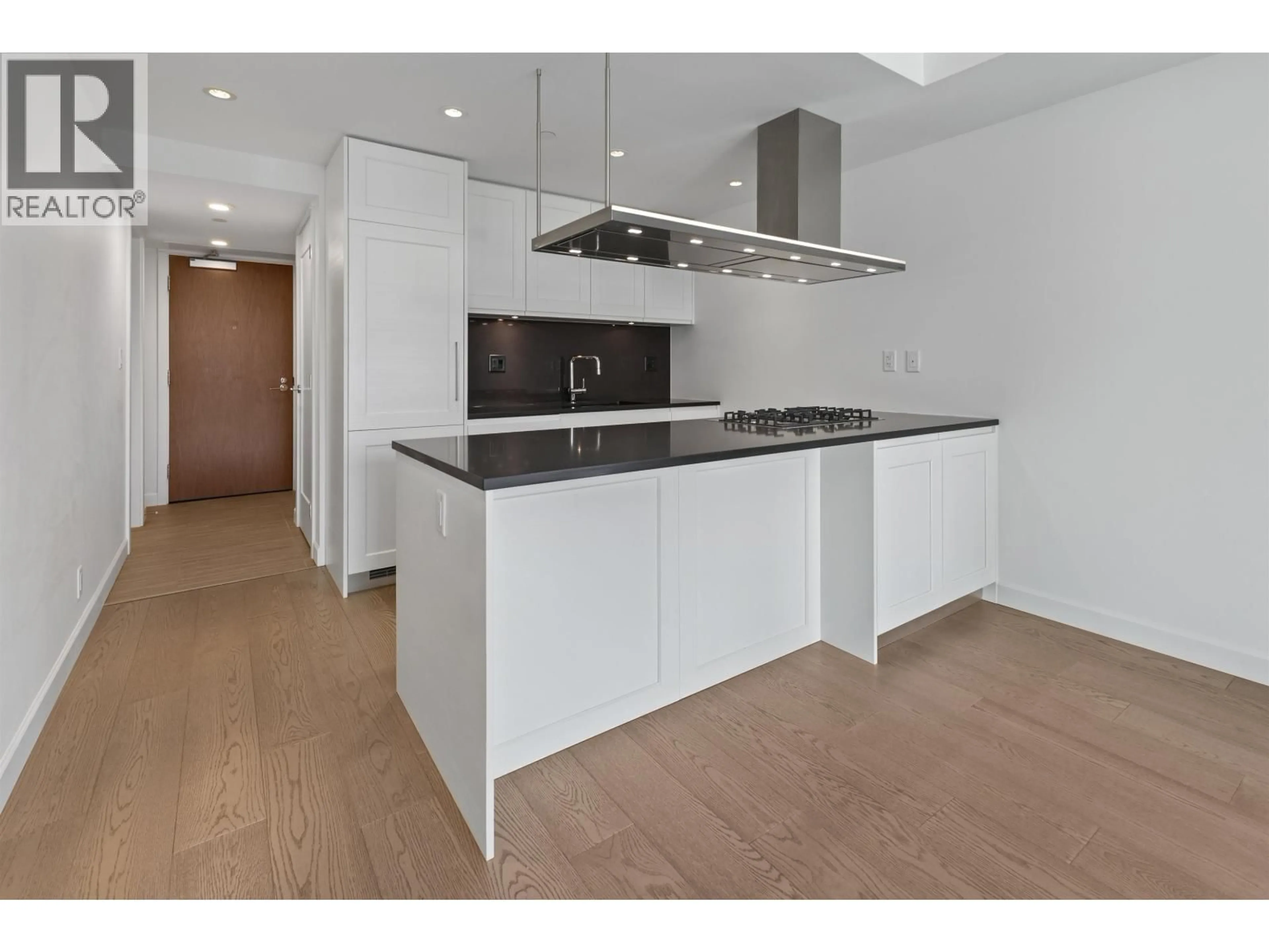 Open concept kitchen, wood/laminate floor for 1703 - 3355 BINNING ROAD, Vancouver British Columbia V6S0J1
