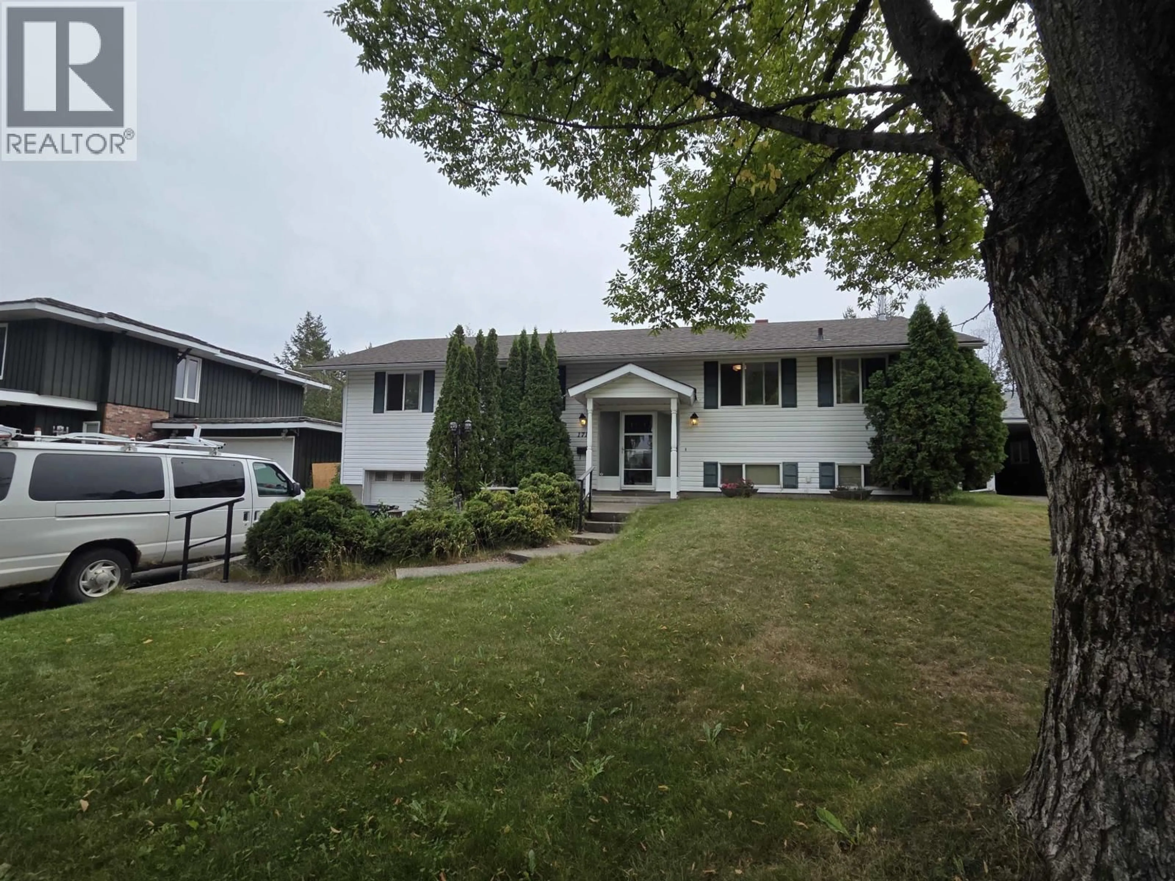 Home with vinyl exterior material, street for 1710 HARPER DRIVE, Prince George British Columbia V2M2Y8