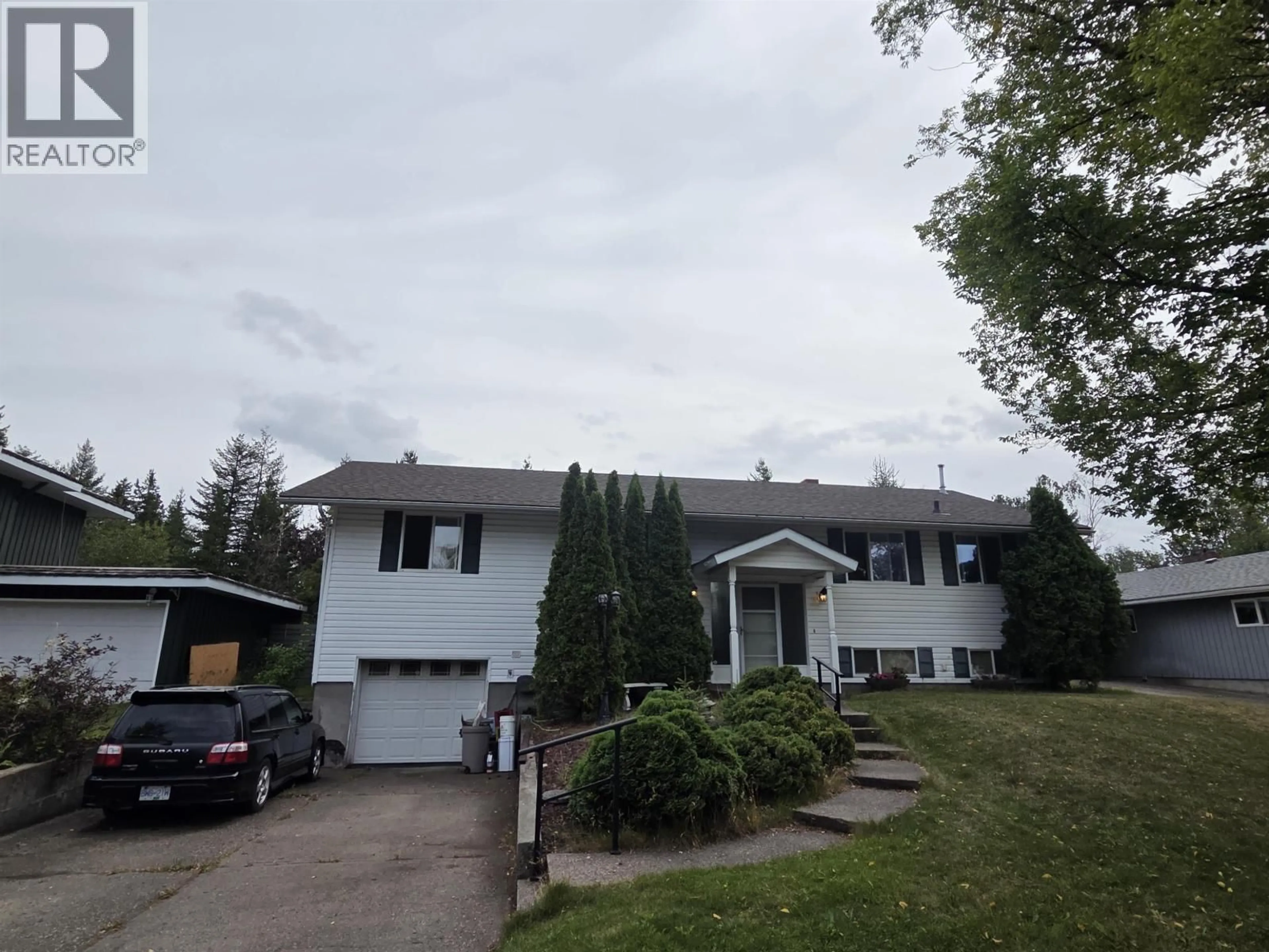 Home with vinyl exterior material, street for 1710 HARPER DRIVE, Prince George British Columbia V2M2Y8