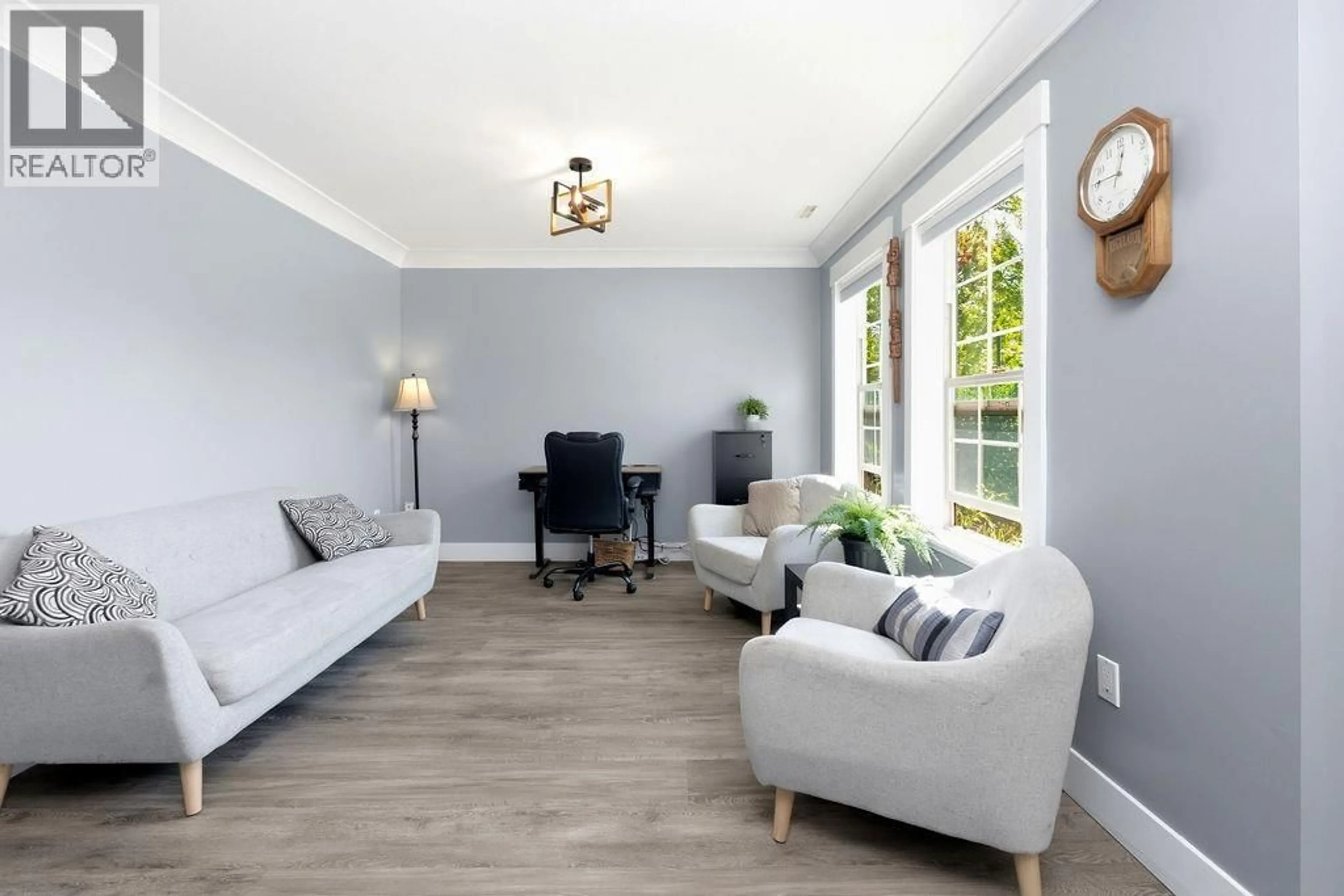 Living room with furniture, wood/laminate floor for 1048 WOODSWORTH ROAD, Gibsons British Columbia V0N1V7