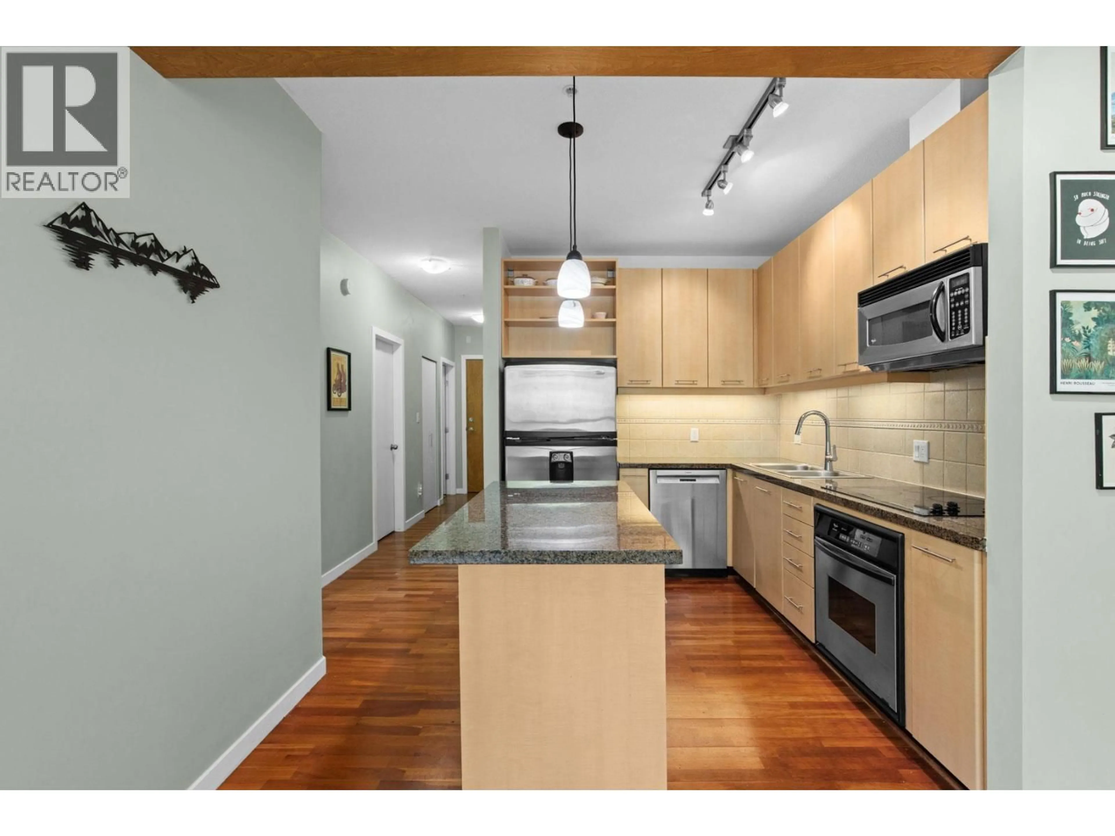 Open concept kitchen, wood/laminate floor for 408 - 560 RAVENWOODS DRIVE, North Vancouver British Columbia V7G2T3