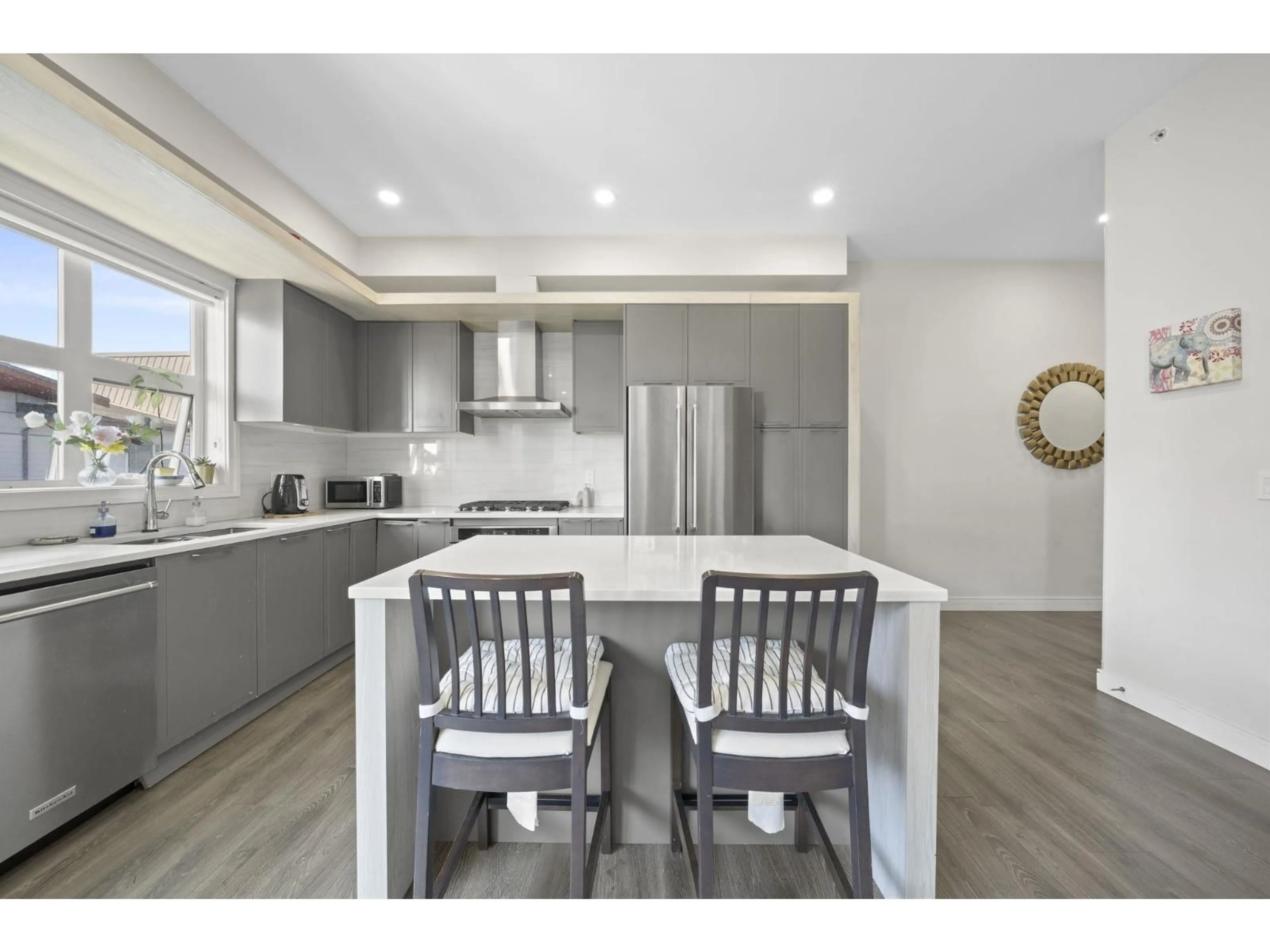 Open concept kitchen, unknown for 616 - 11507 84 AVENUE, Delta British Columbia V4C0E5