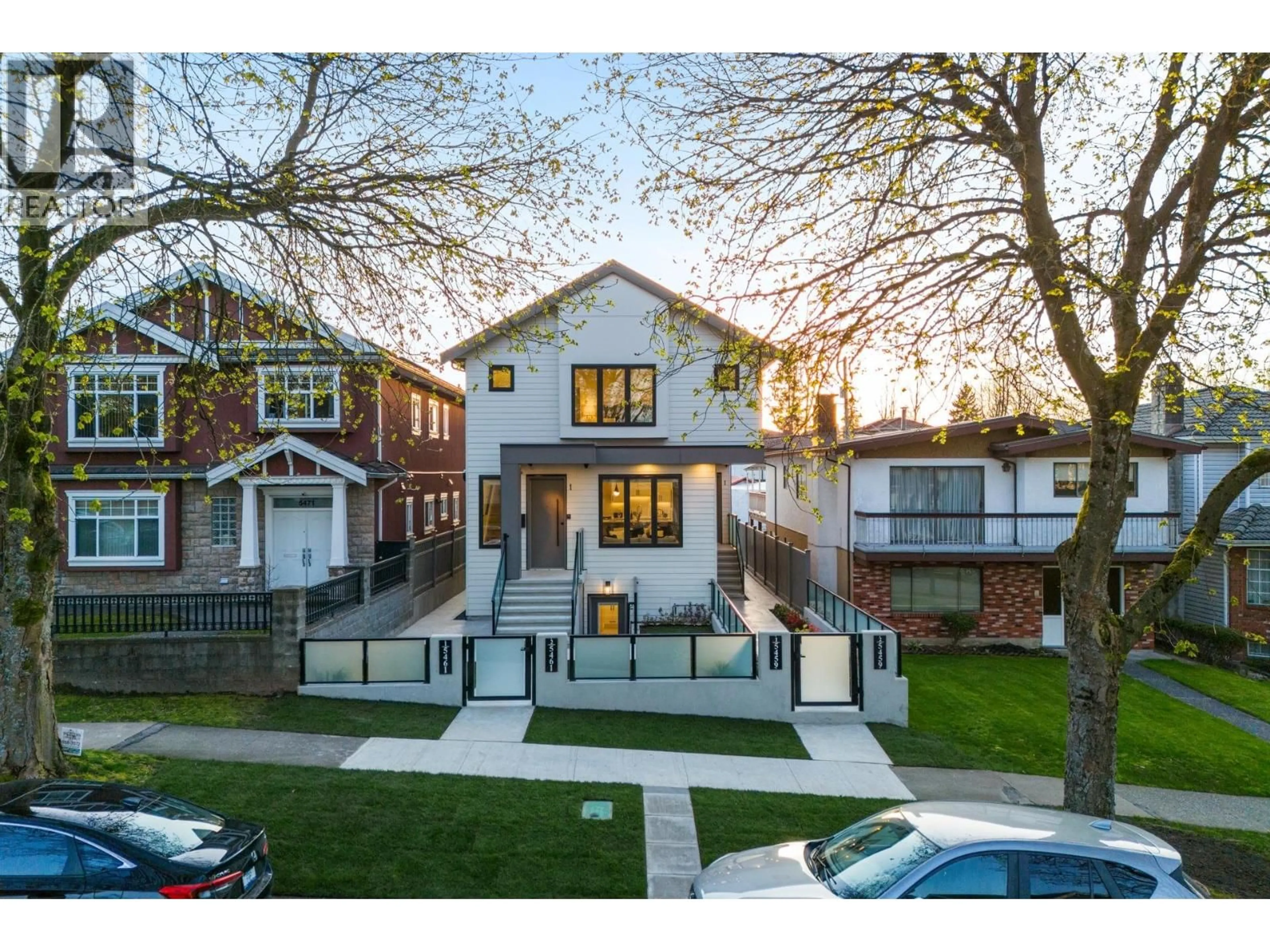 A pic from outside/outdoor area/front of a property/back of a property/a pic from drone, street for 1 - 5459 RHODES STREET, Vancouver British Columbia V5R3P1