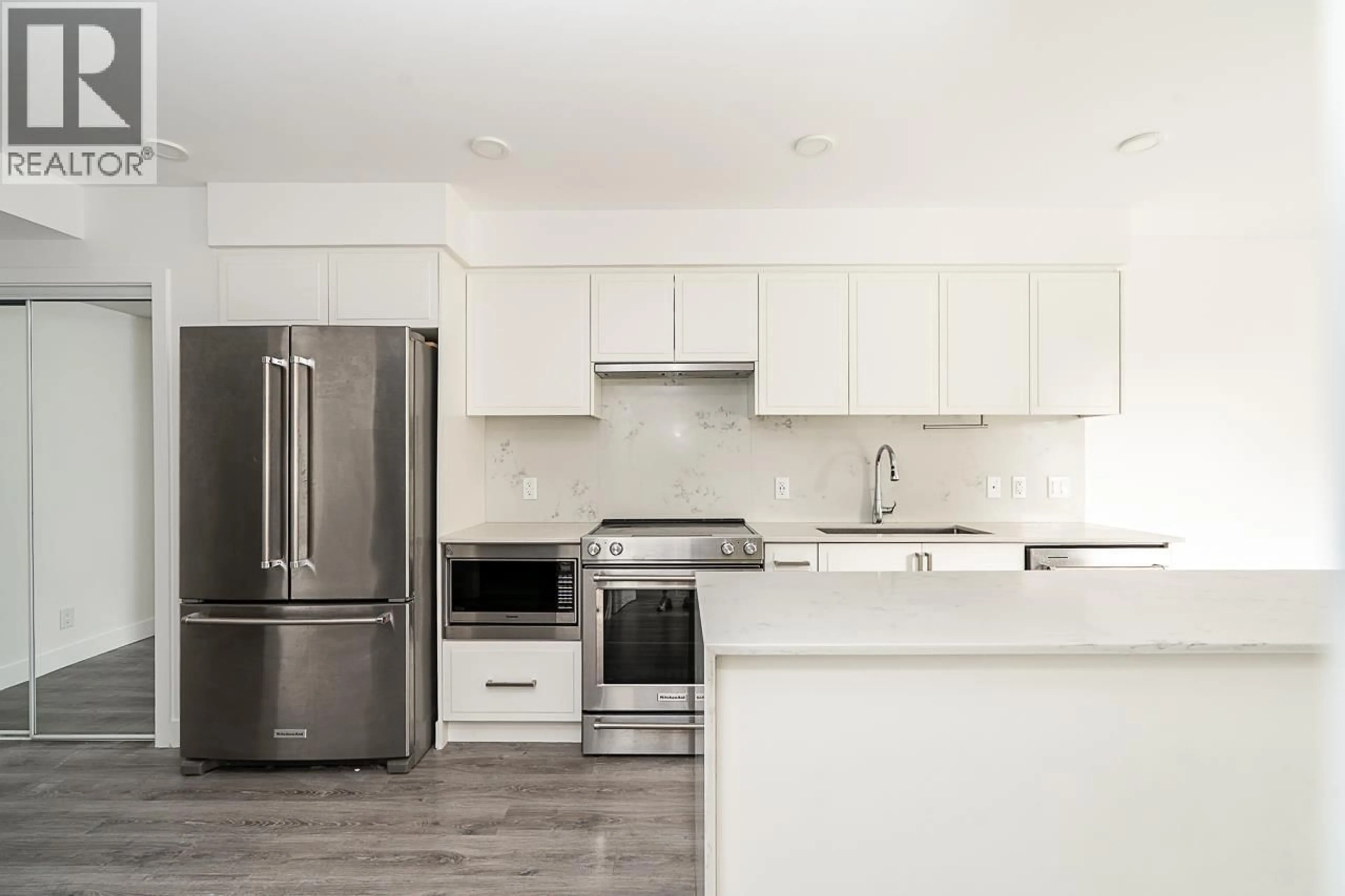 Open concept kitchen, unknown for 205 - 700 CLARKE ROAD, Coquitlam British Columbia V3J0K5