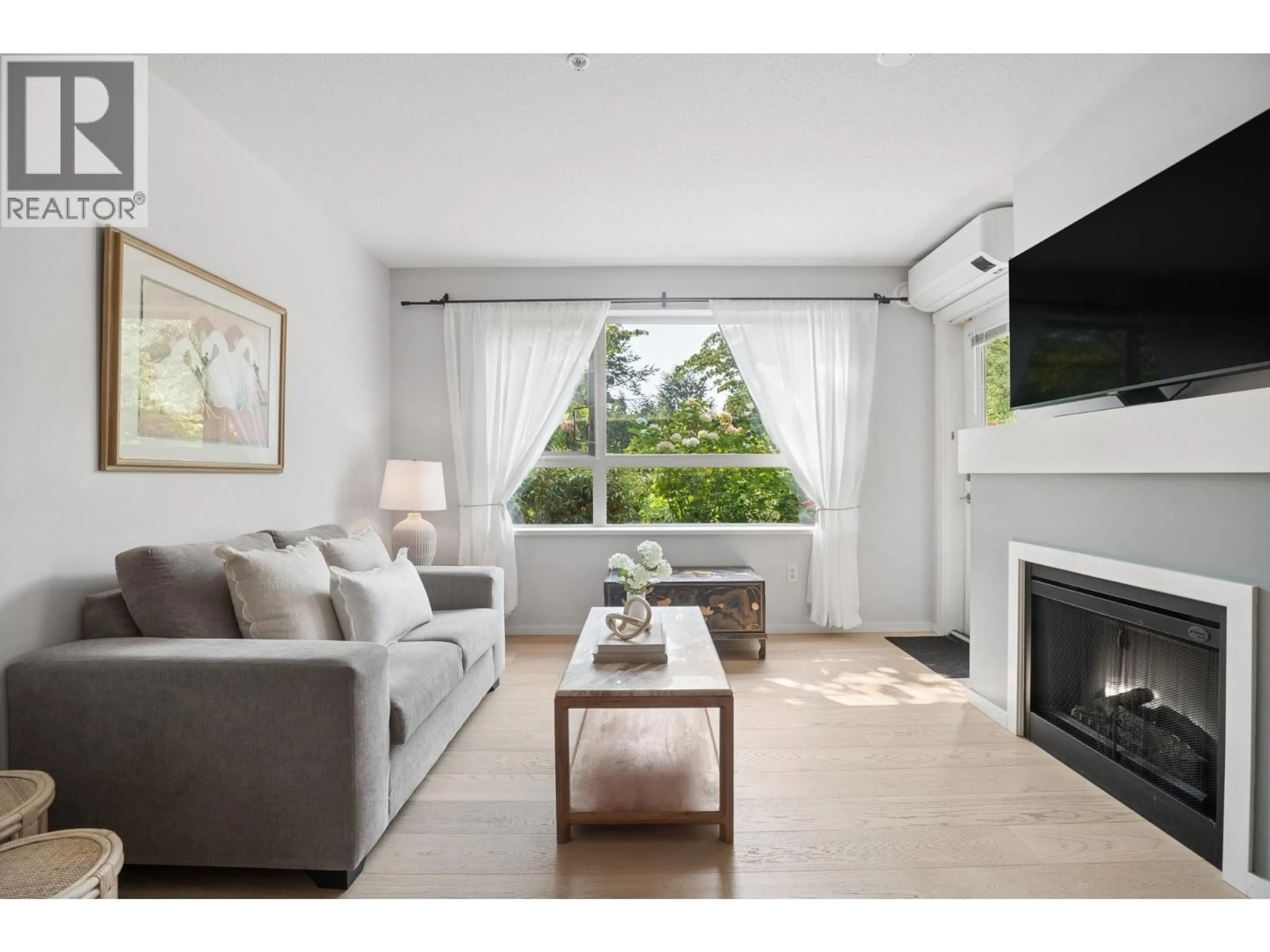 Living room with furniture, unknown for 109 - 600 KLAHANIE DRIVE, Port Moody British Columbia V3H5L2
