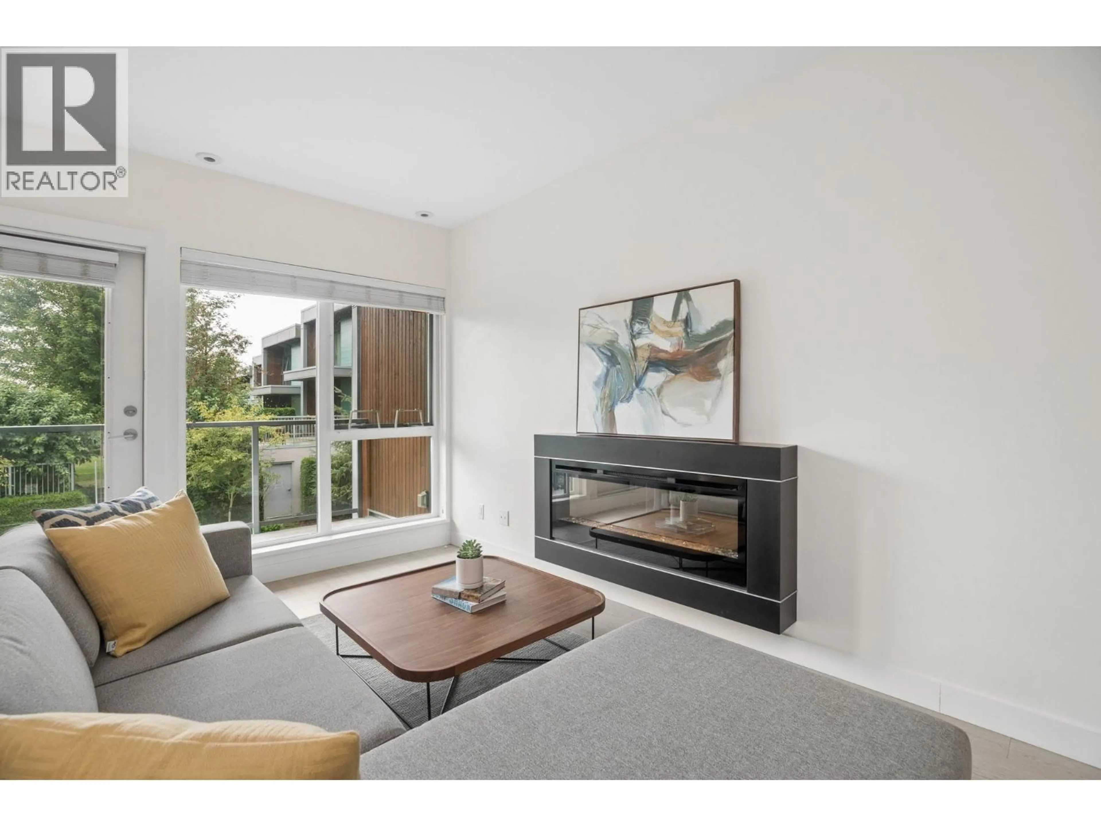 Living room with furniture, wood/laminate floor for 16 - 3596 SALAL DRIVE, North Vancouver British Columbia V7G0A9