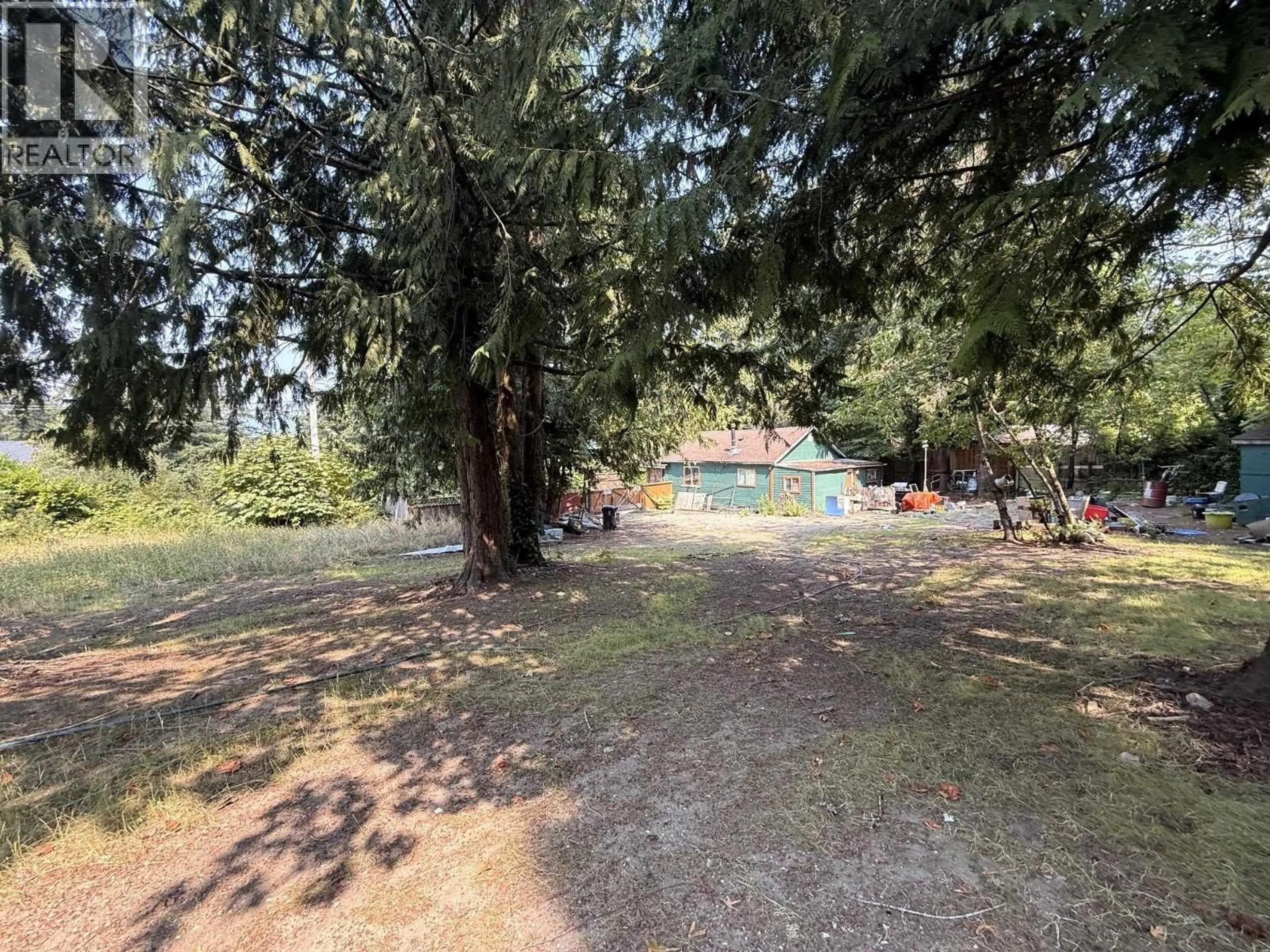 A pic from outside/outdoor area/front of a property/back of a property/a pic from drone, forest/trees view for 5700 PORPOISE BAY ROAD, Sechelt British Columbia V0N3A0