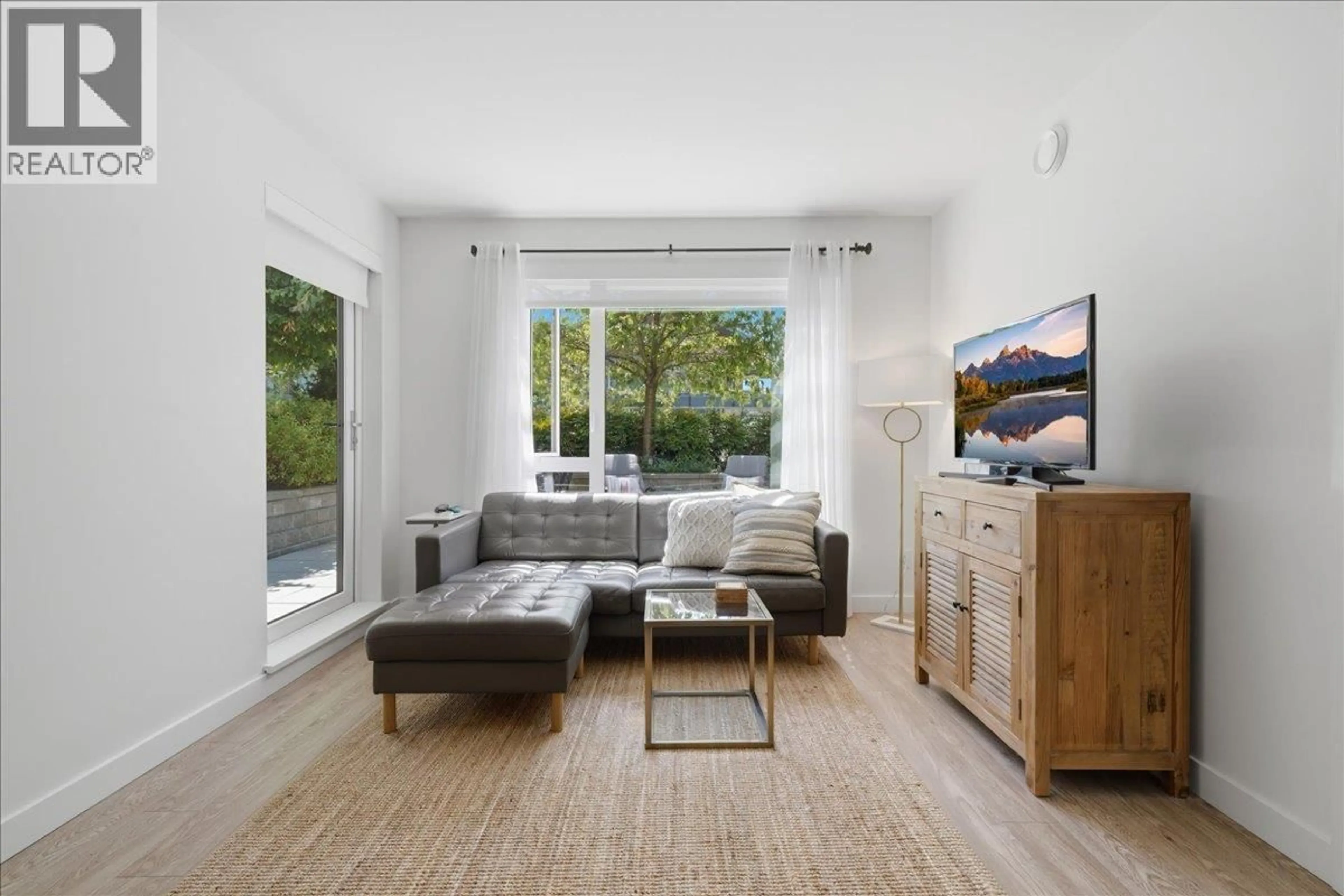 Living room with furniture, unknown for 207 - 1061 MARINE DRIVE, North Vancouver British Columbia V7P1S6