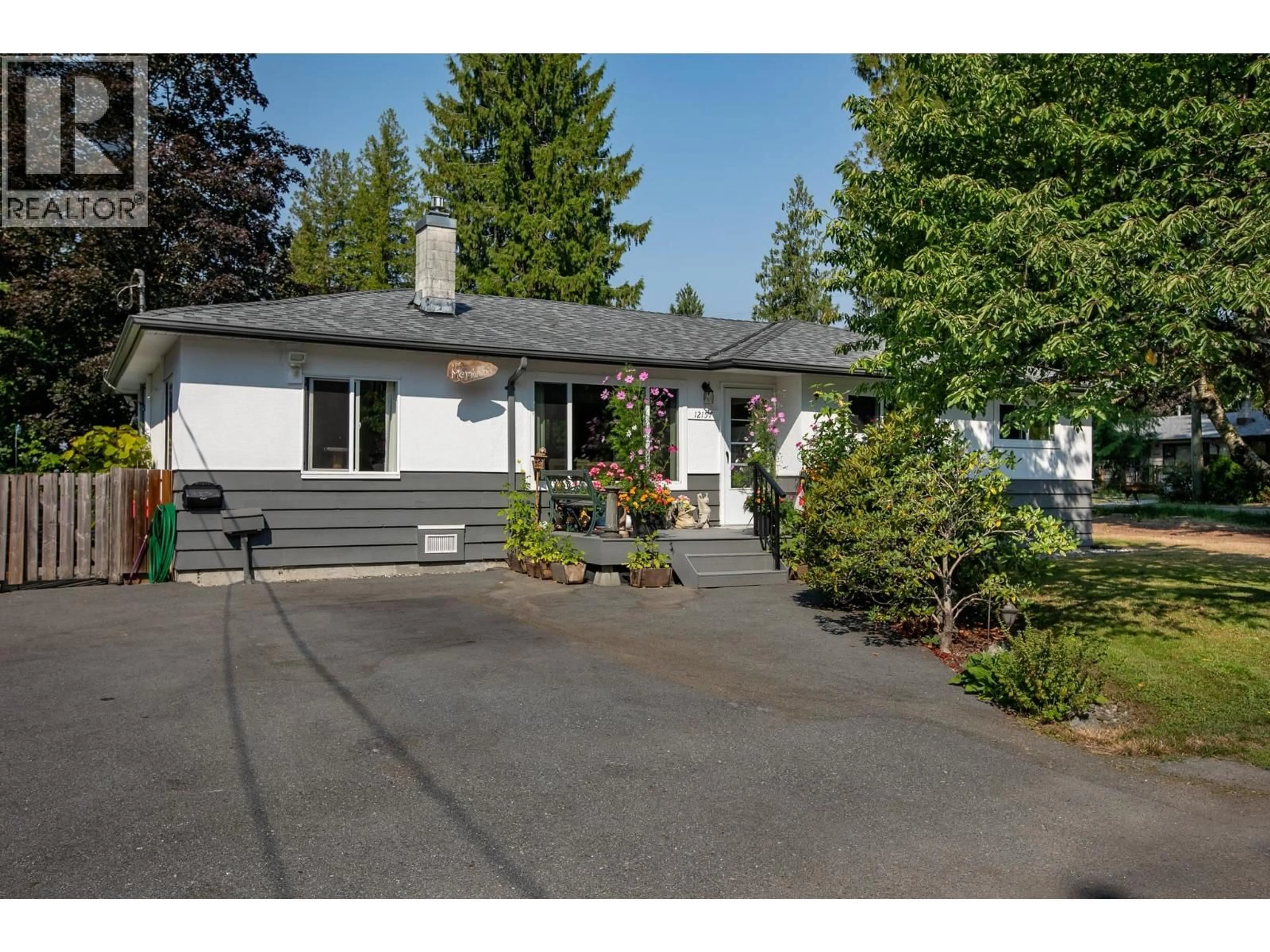Home with vinyl exterior material, street for 12157 250 STREET, Maple Ridge British Columbia V4R1H3