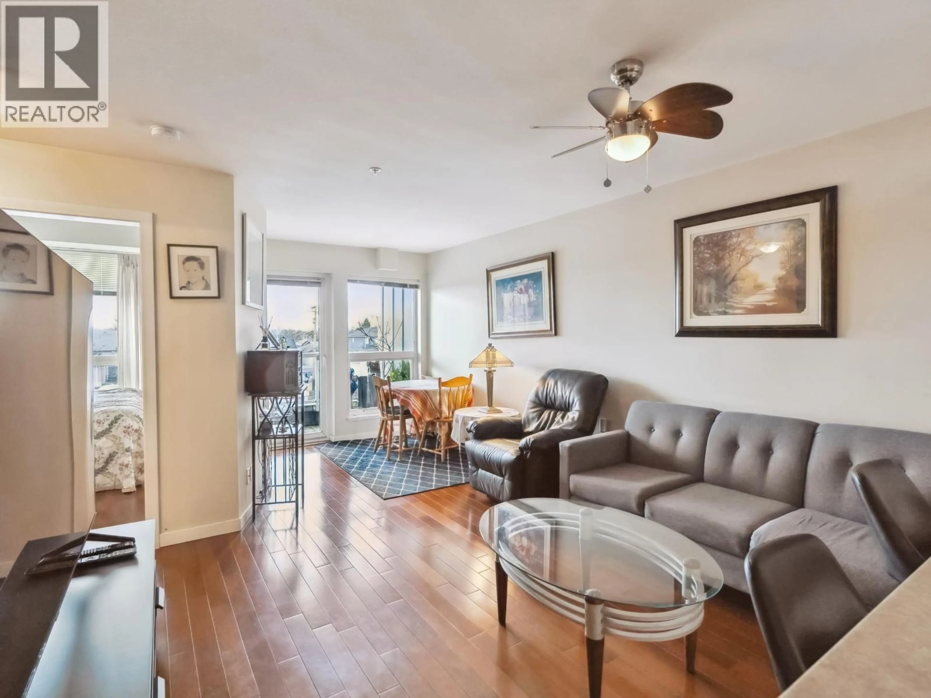 Living room with furniture, wood/laminate floor for 416 - 2891 HASTINGS STREET, Vancouver British Columbia V5K5J8