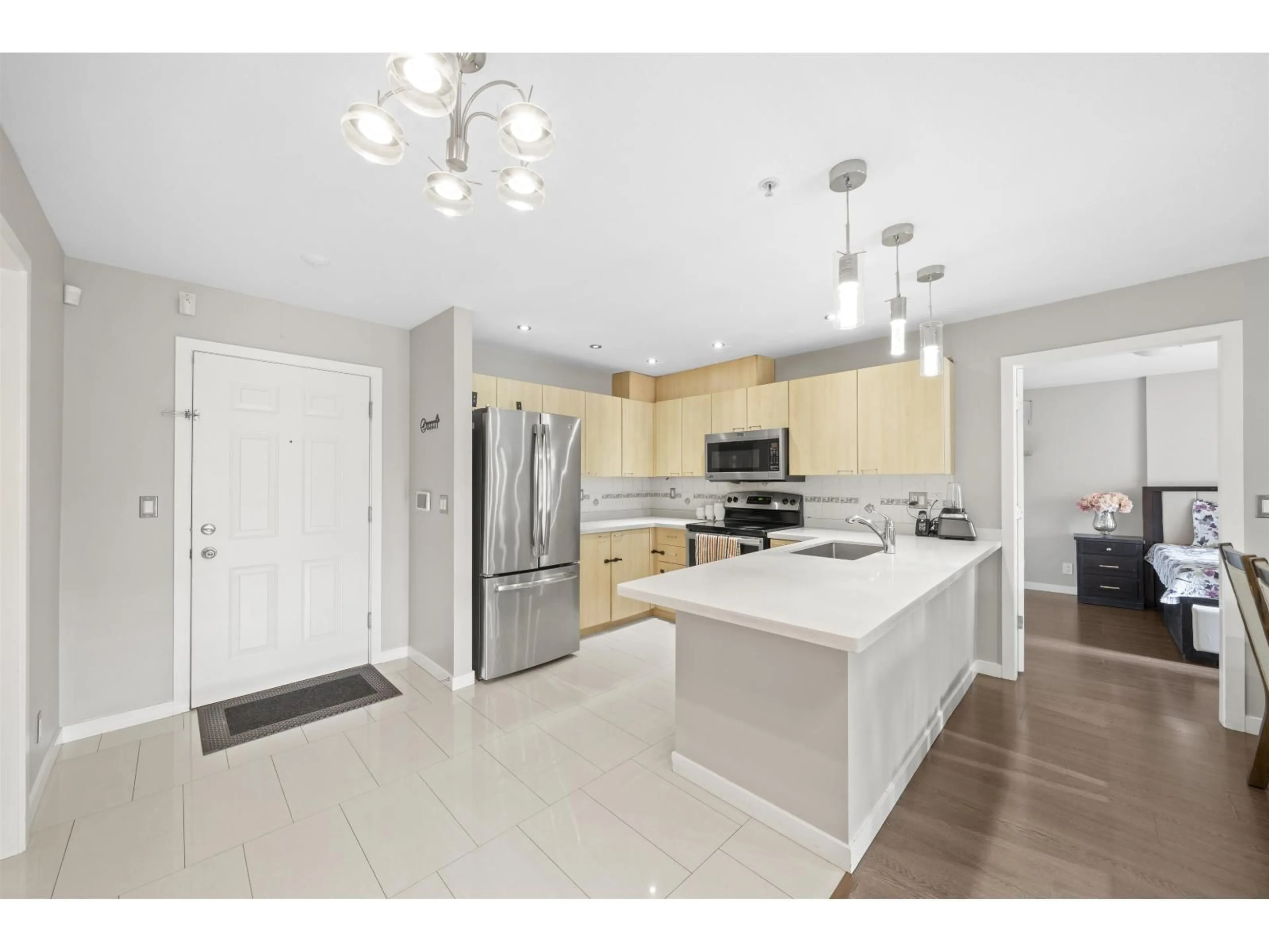 Open concept kitchen, ceramic/tile floor for 207 - 12083 92A AVENUE, Surrey British Columbia V3V8C8