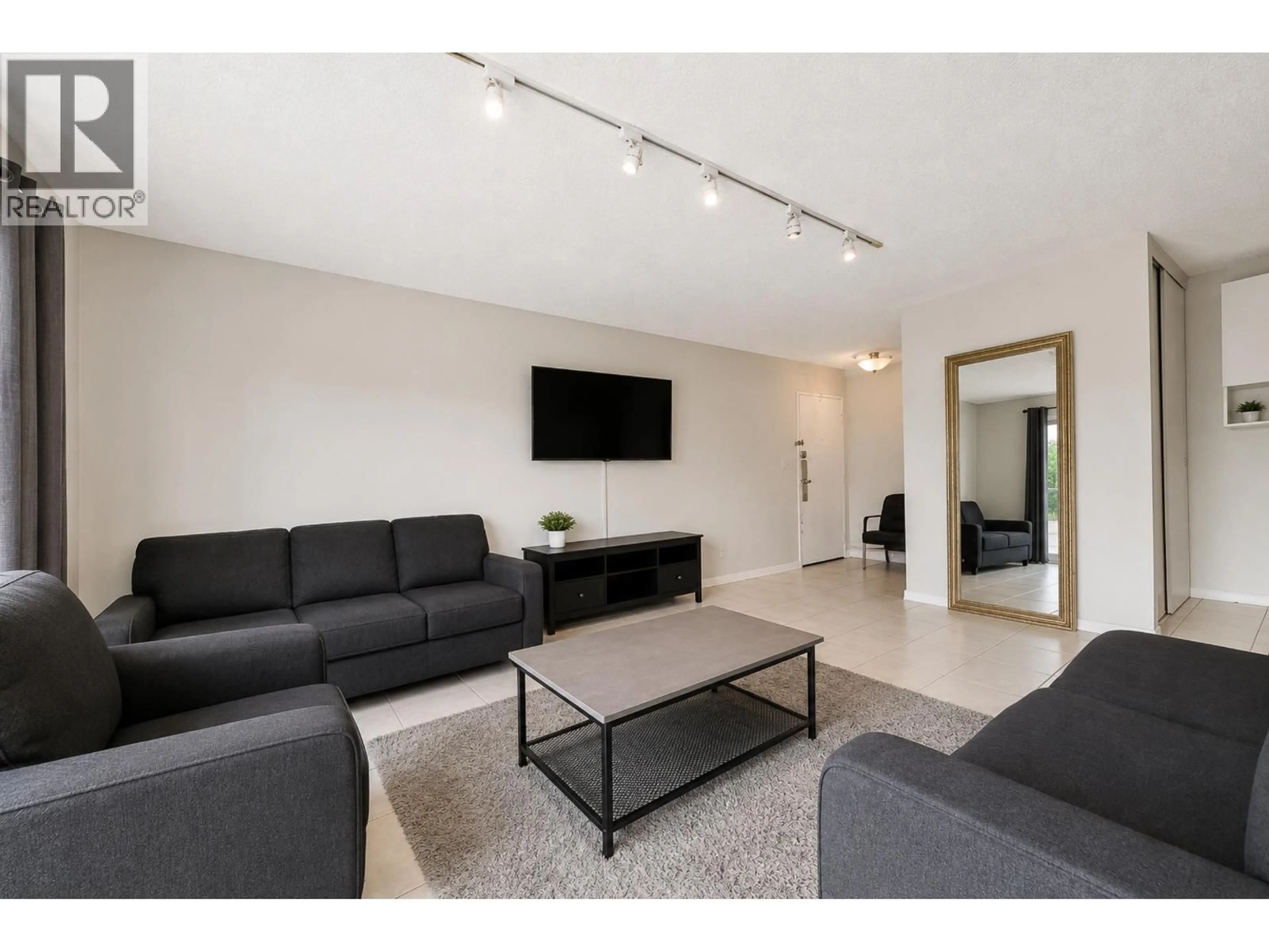 Living room with furniture, unknown for 306 - 7200 LINDSAY ROAD, Richmond British Columbia V6E1S8
