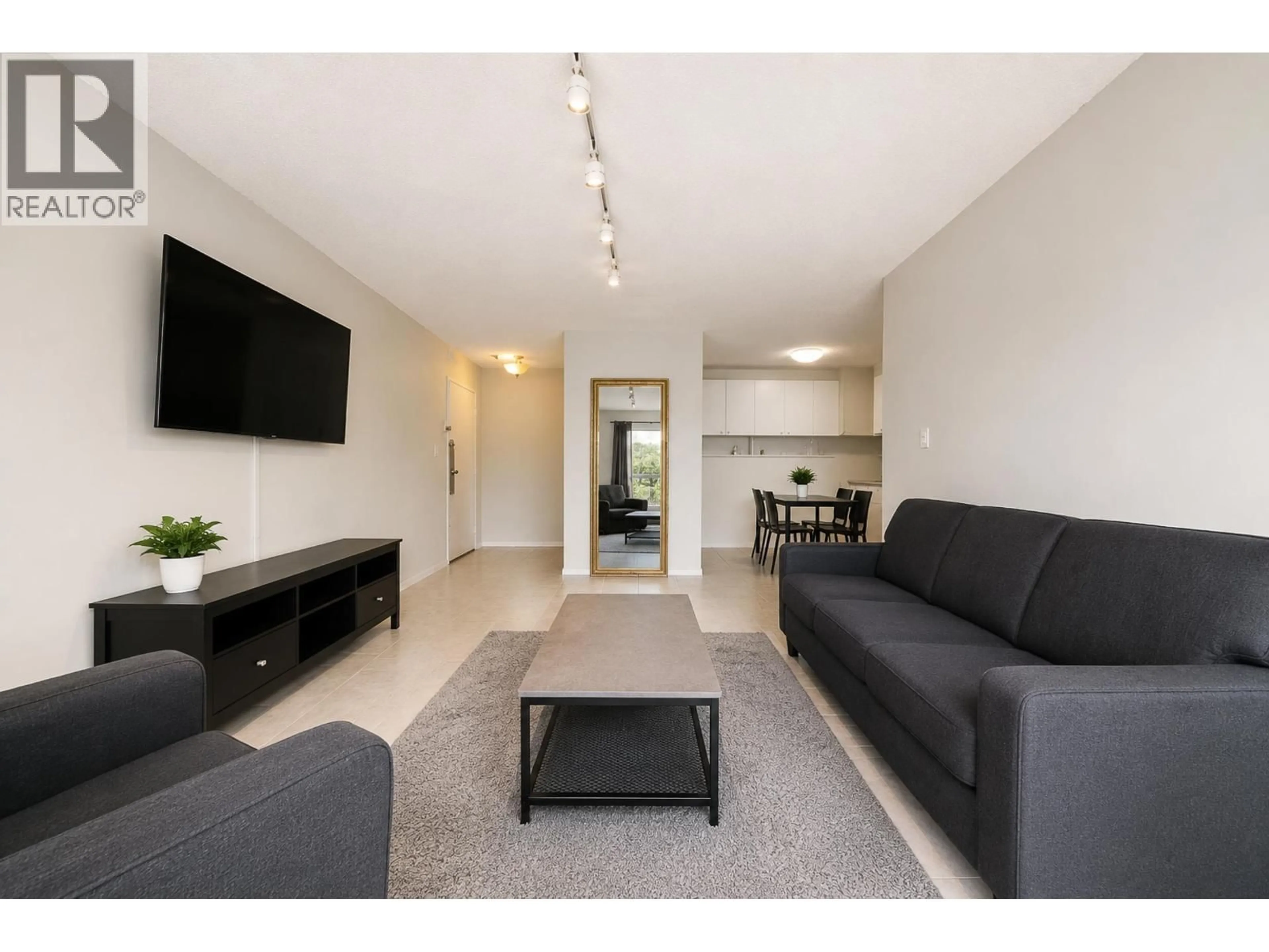 Living room with furniture, unknown for 306 - 7200 LINDSAY ROAD, Richmond British Columbia V6E1S8
