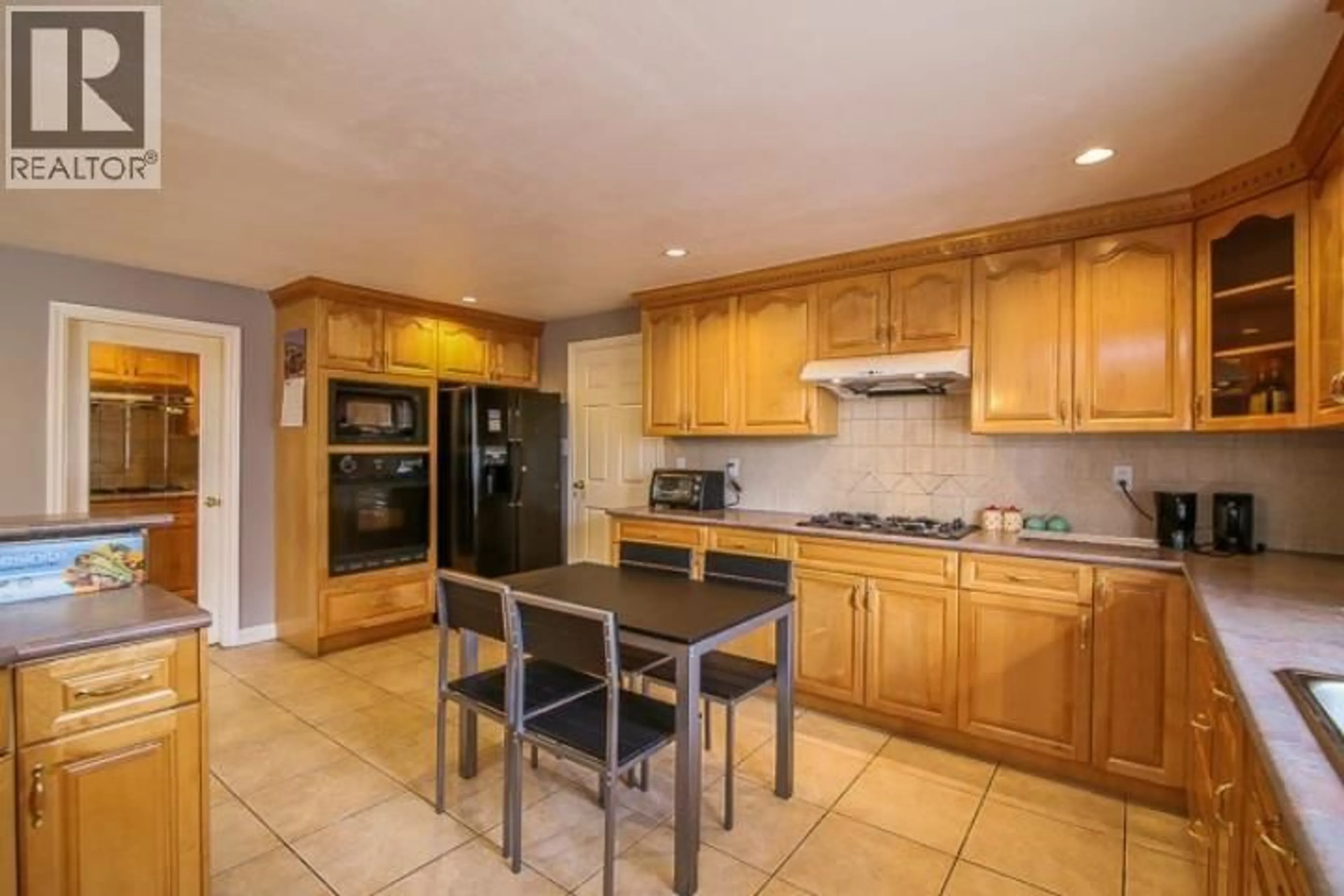 Standard kitchen, ceramic/tile floor for 8820 NO. 4 ROAD, Richmond British Columbia V6Y2T6