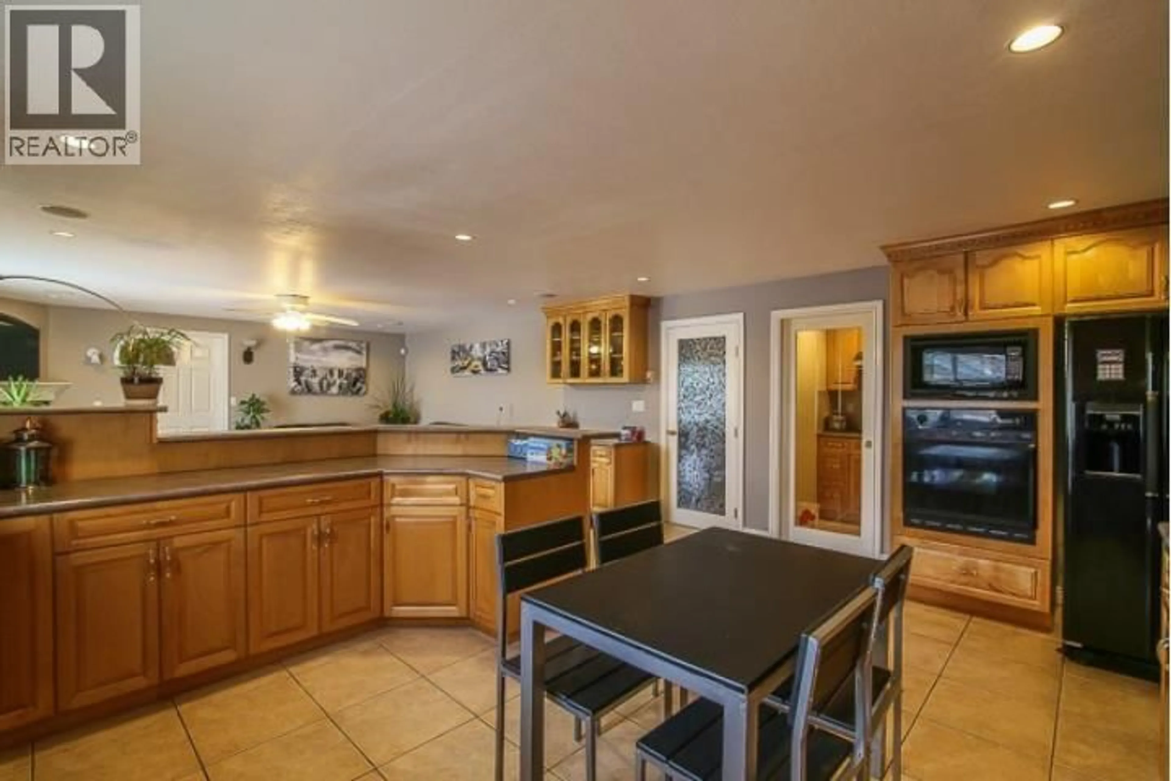 Open concept kitchen, ceramic/tile floor for 8820 NO. 4 ROAD, Richmond British Columbia V6Y2T6