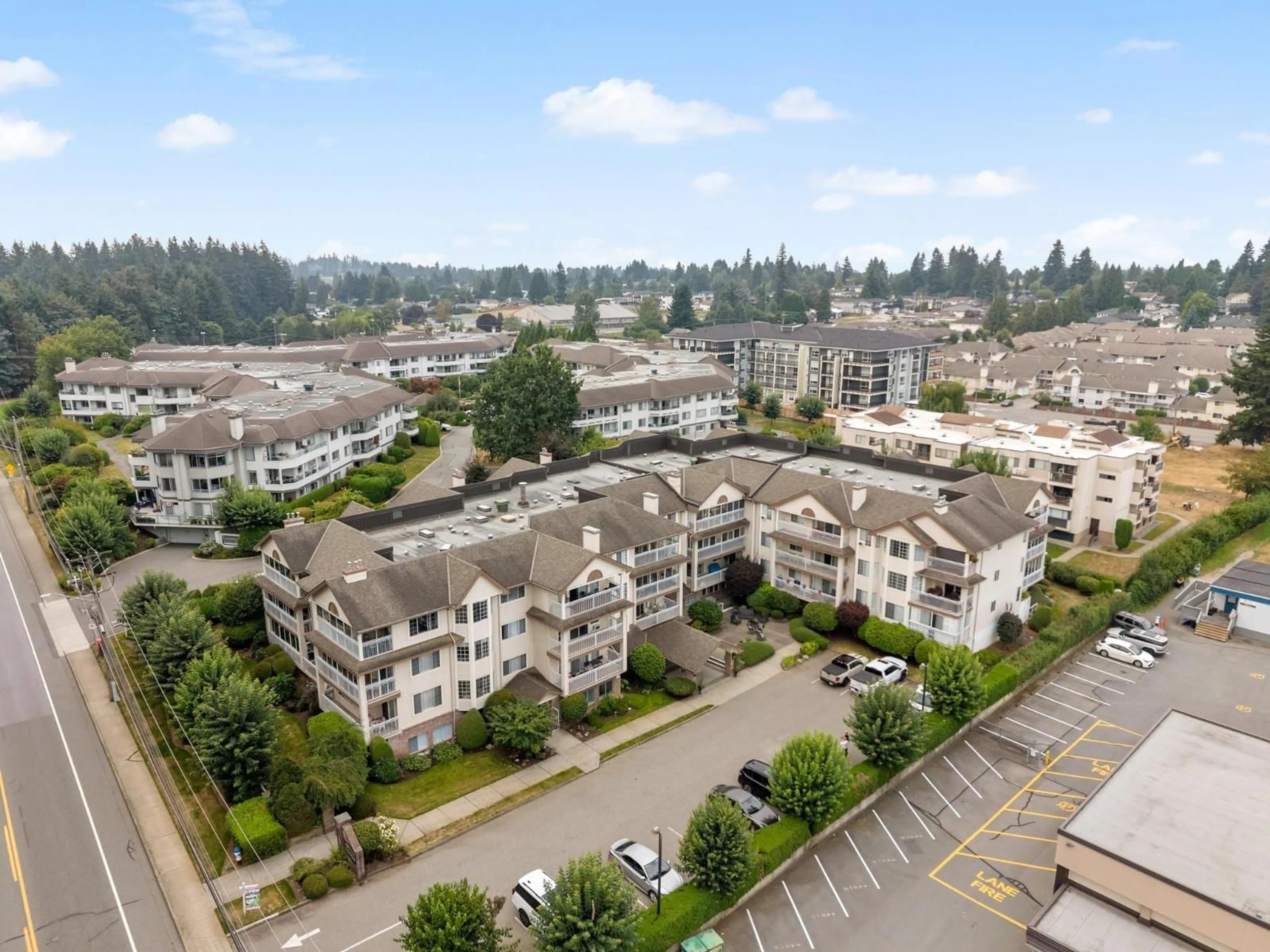 A pic from outside/outdoor area/front of a property/back of a property/a pic from drone, mountain view for 201 - 2491 GLADWIN ROAD, Abbotsford British Columbia V2T3N8