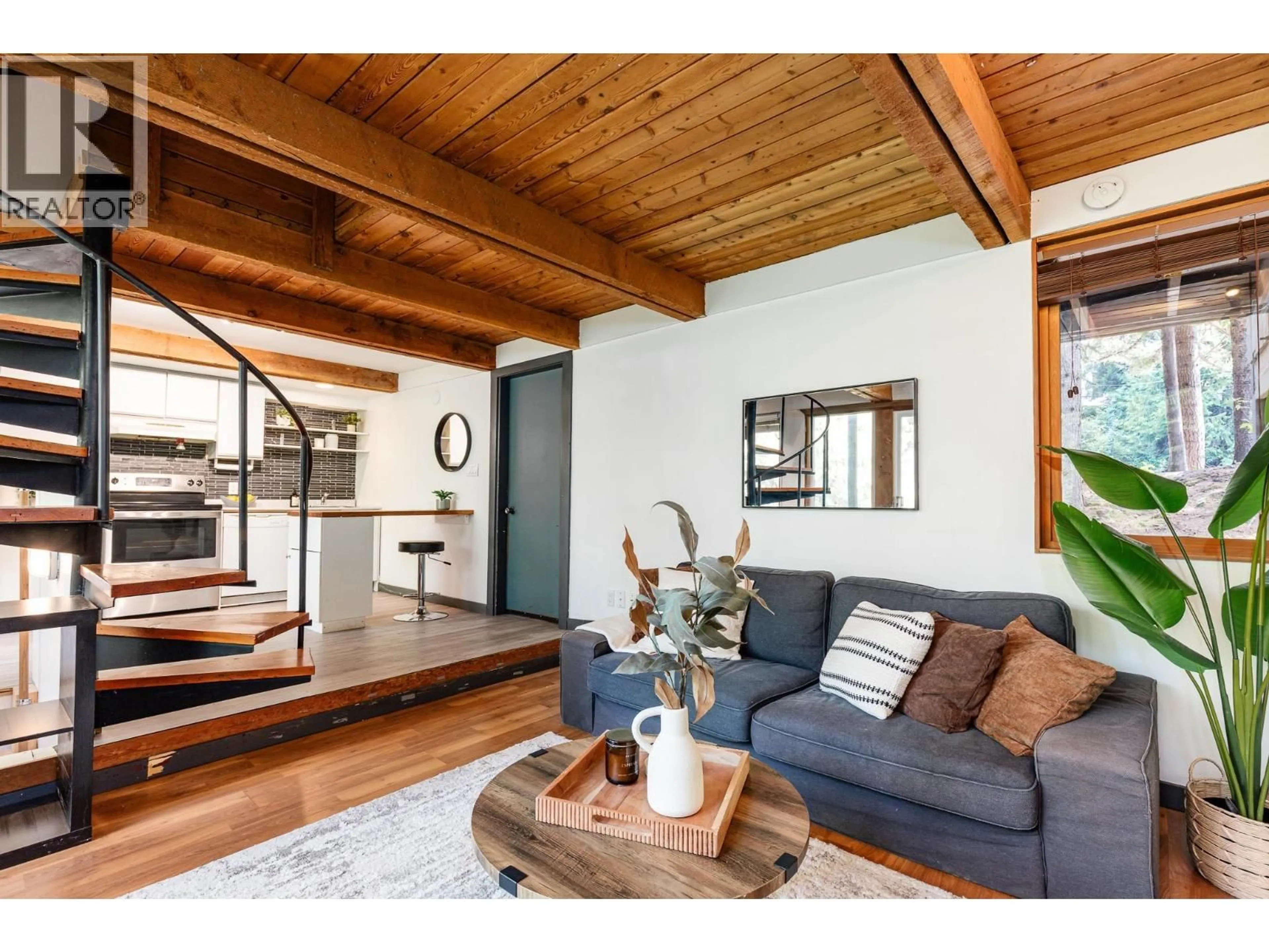 Living room with furniture, wood/laminate floor for 12 - 2301 CAVENDISH WAY, Whistler British Columbia V8E0A6